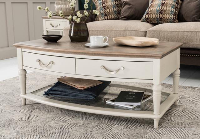 Natural décor with painted and wood coffee table.