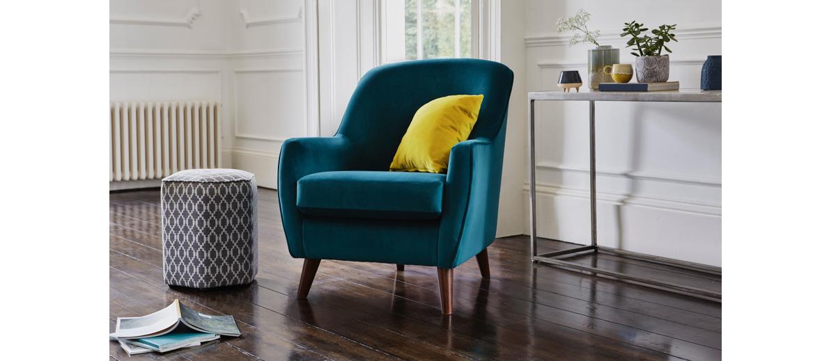 Teal fabric accent chair with yellow cushion