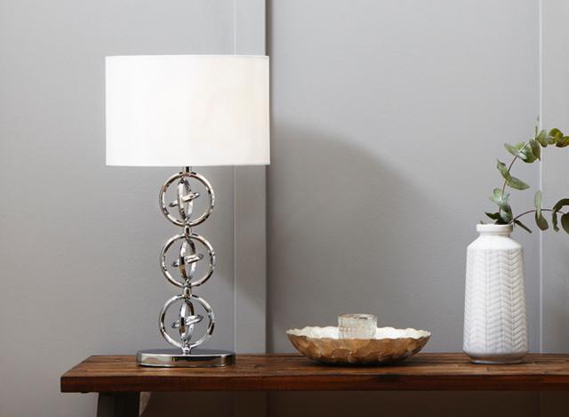 Modern white table lamp with metal ring stem