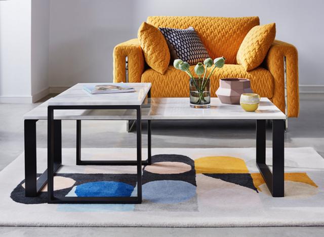 Mustard cuddle chair with nest coffee table