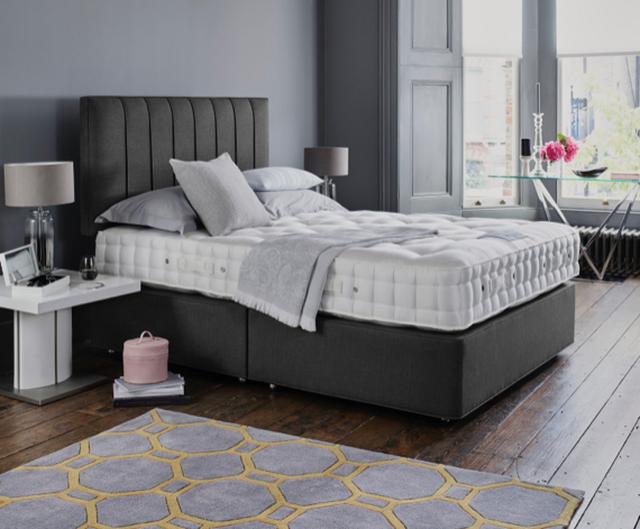 Grey headboard on Hypnos bed – grey bedroom ideas