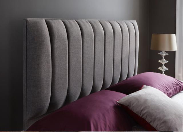 Dove grey bed with fluted headboard