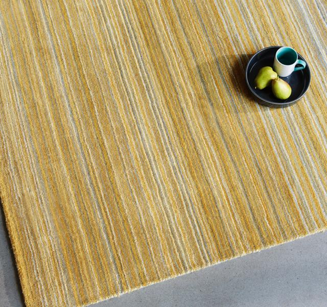 Bedroom colour scheme ideas – mustard rug