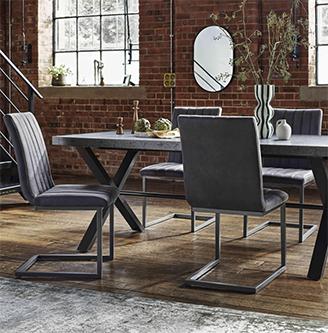Moon Dining Table with X Shaped Legs and 4 Fabric Cantilever Dining Chairs
