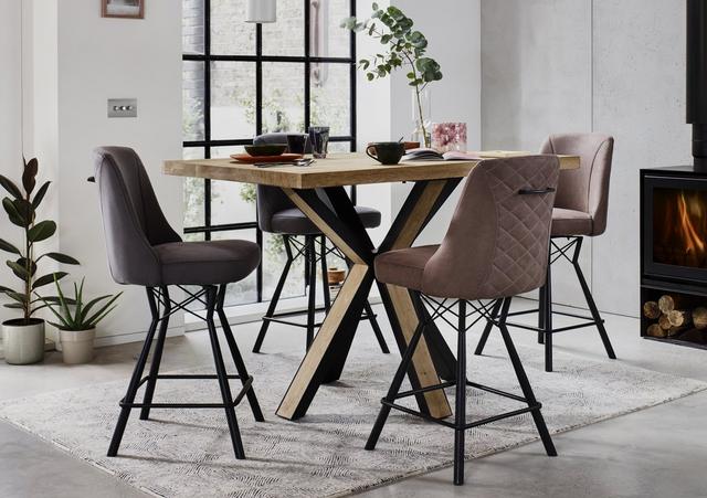 Wooden bar table with upholstered chairs