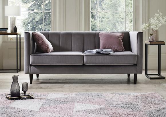 Grey sofa with pink accents