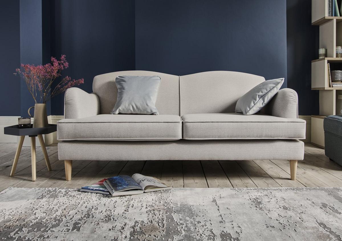 Upholstered grey sofa