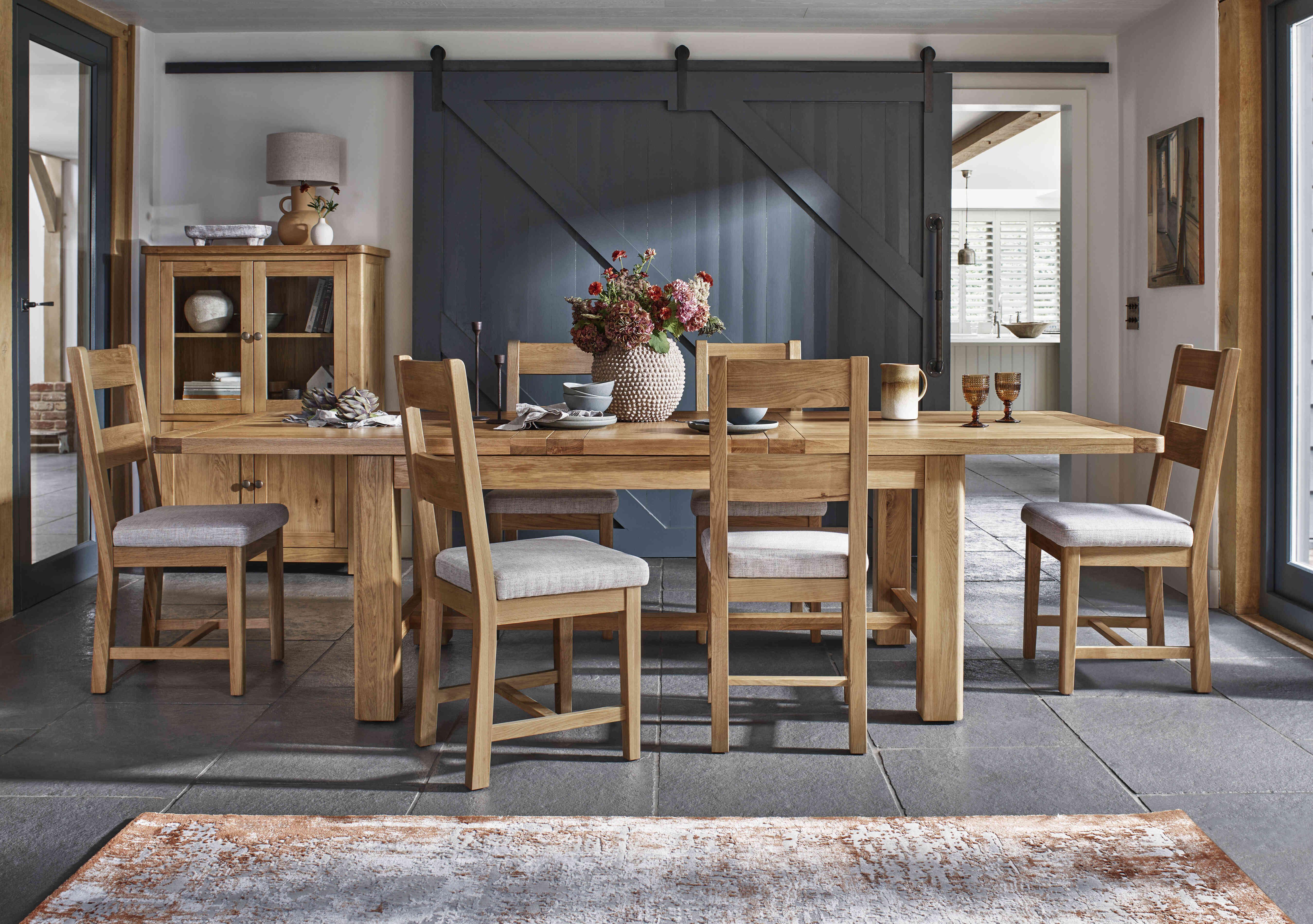 Augusta Large Rectangular Extending Dining Table and 6 Wooden Ladderback Dining Chairs in  on Furniture Village