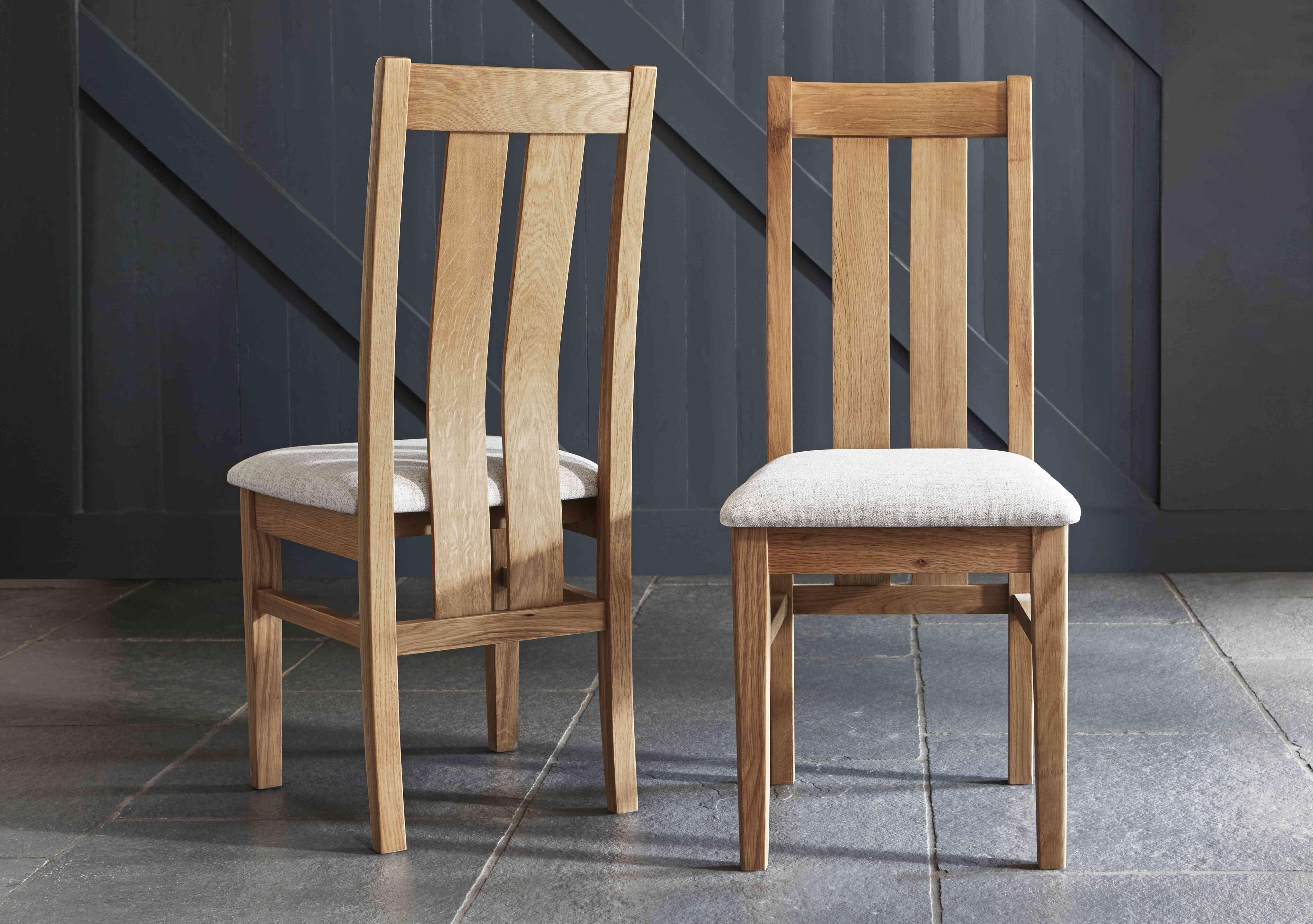 Augusta Pair of Wooden Slatted Back Dining Chairs in  on Furniture Village