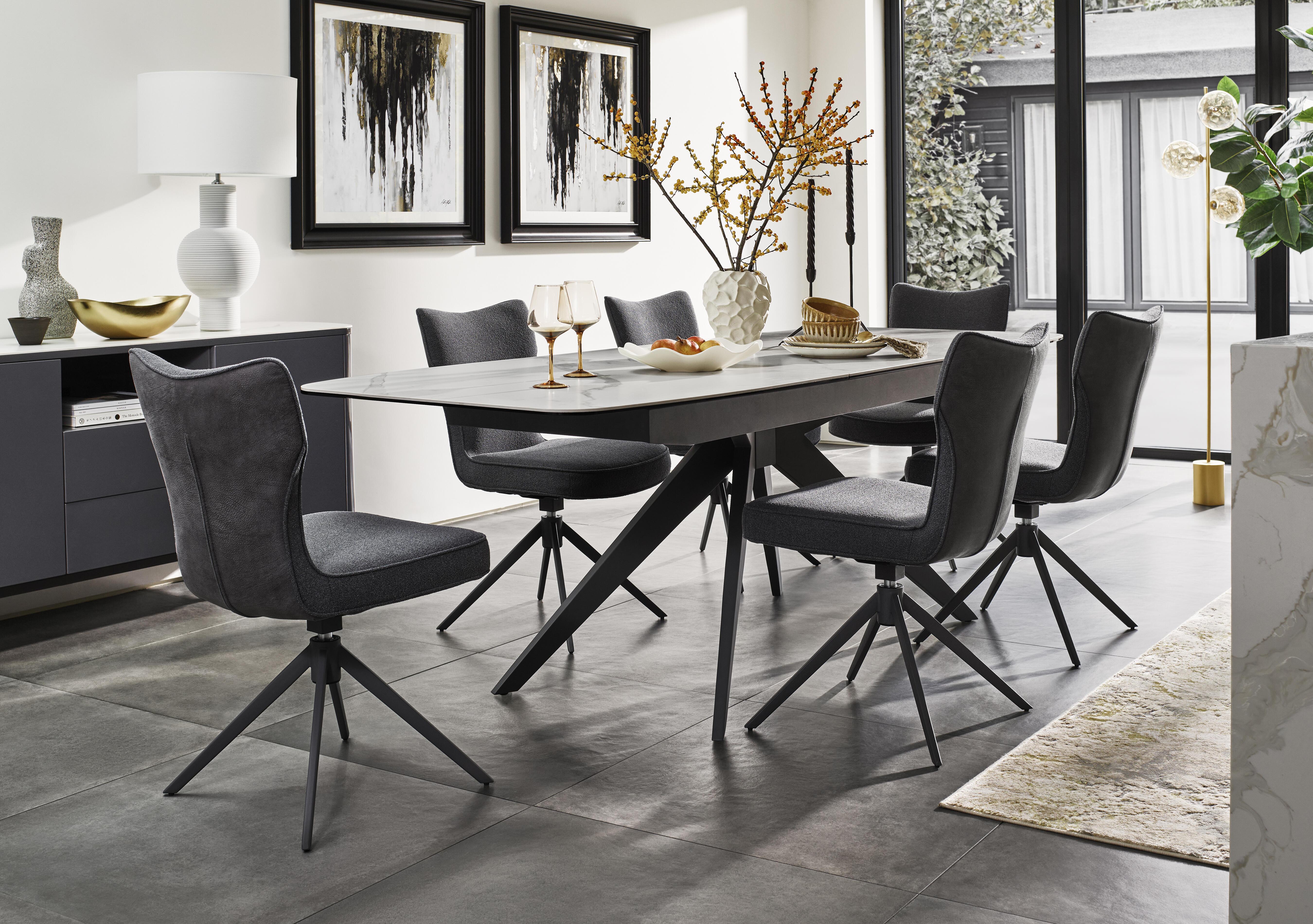 Carrera 180cm Pop Up Extending Dining Table and 6 Swivel Dining Chairs in  on Furniture Village