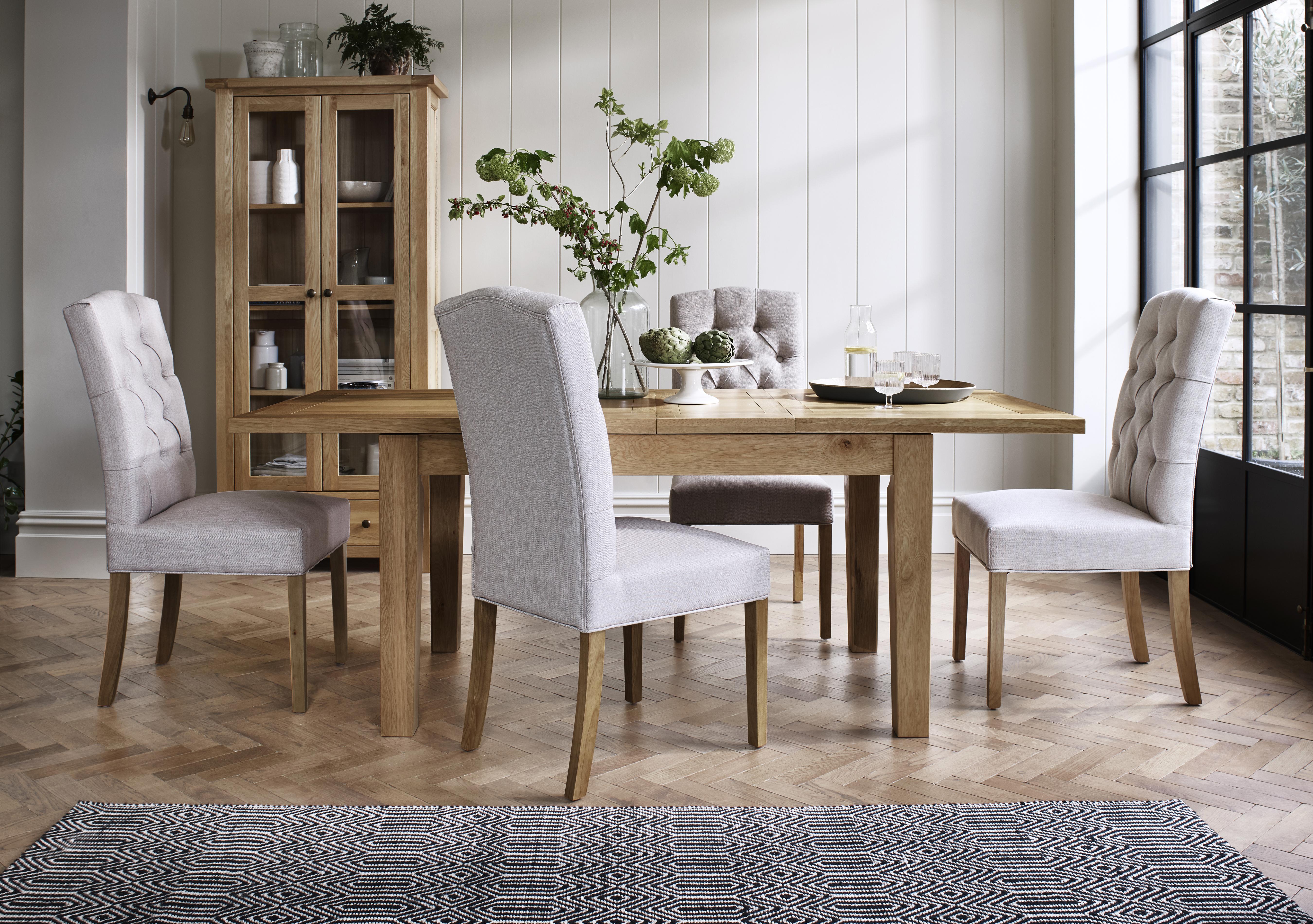 California Solid Oak Rectangular Extending Table and 4 Button Back Upholstered Chairs in  on Furniture Village