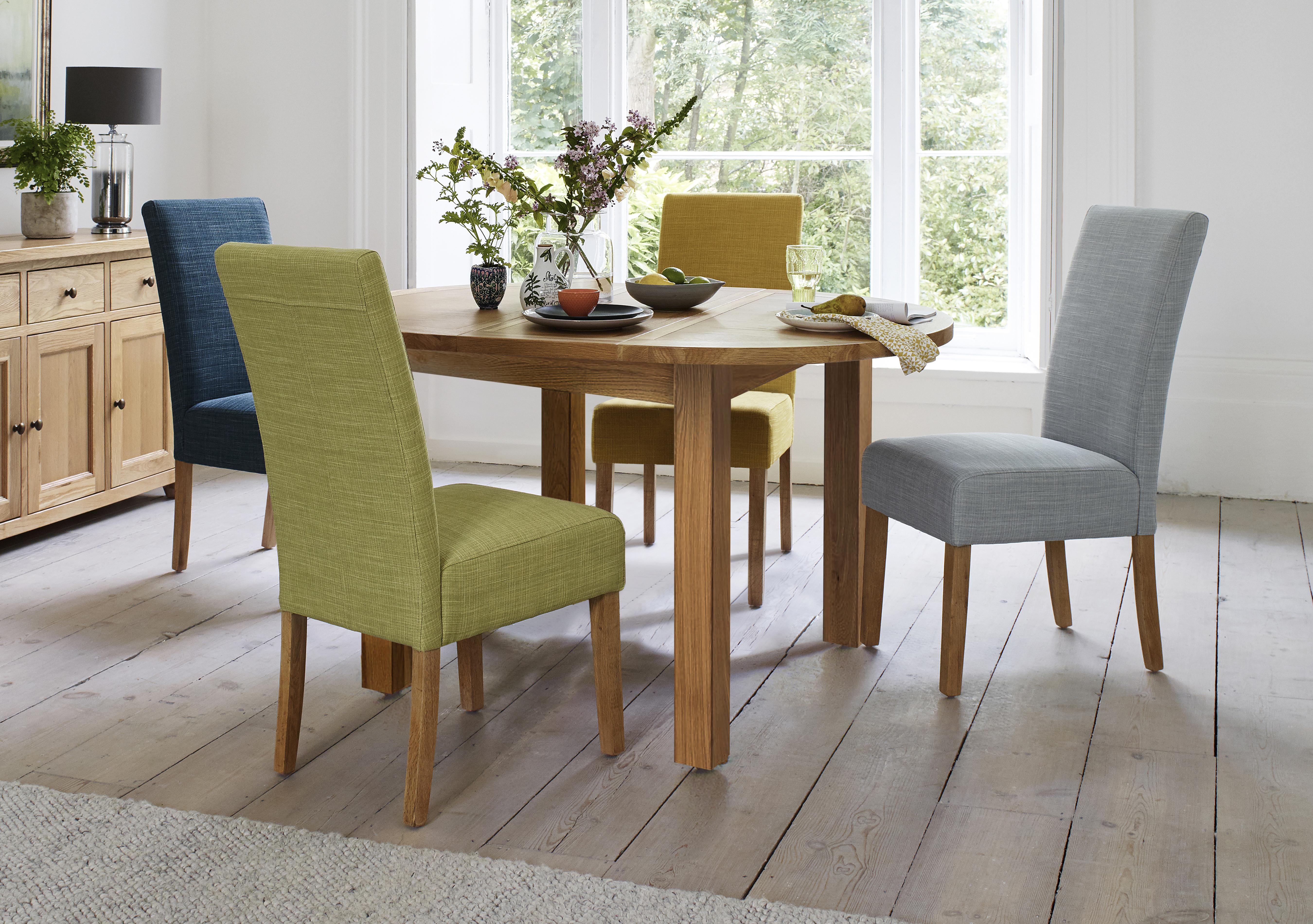 California Round Solid Oak Extending Dining Table in  on Furniture Village