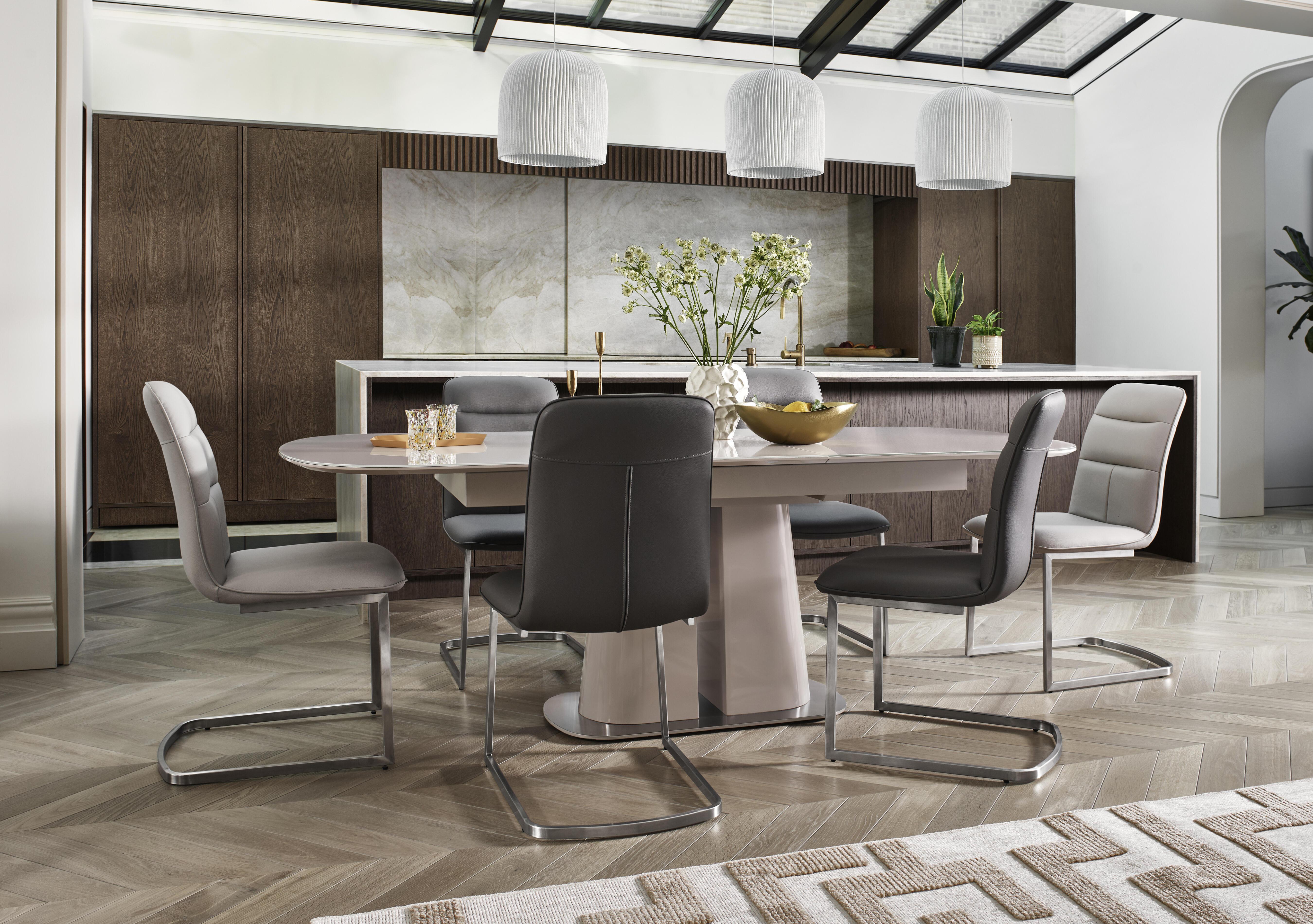 Cashmere Large Pop-Up Extending Dining Table with 4 Charcoal Dining Chairs and 2 Taupe Dining Chairs in  on Furniture Village