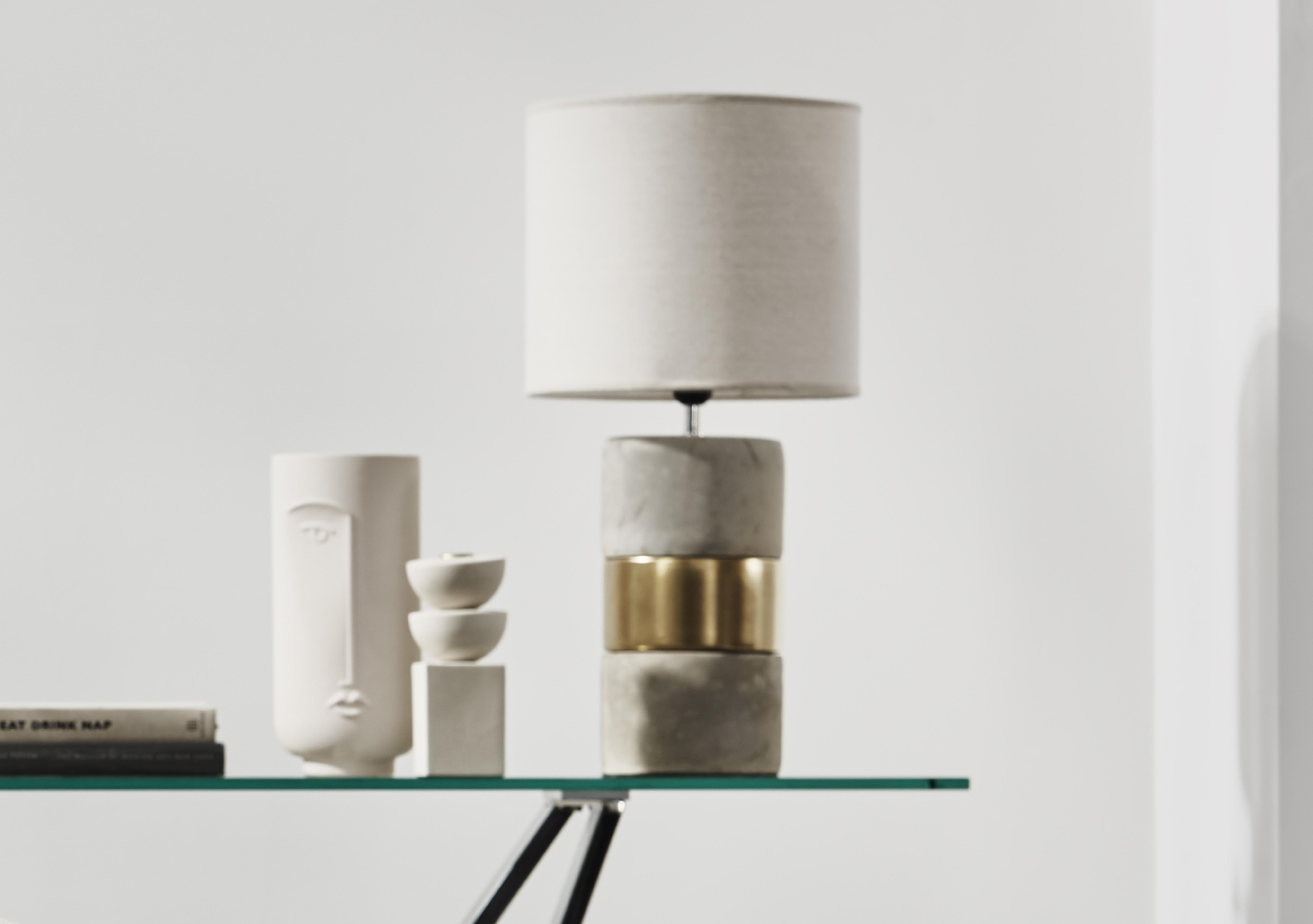 Concrete and Gold Table Lamp in  on Furniture Village