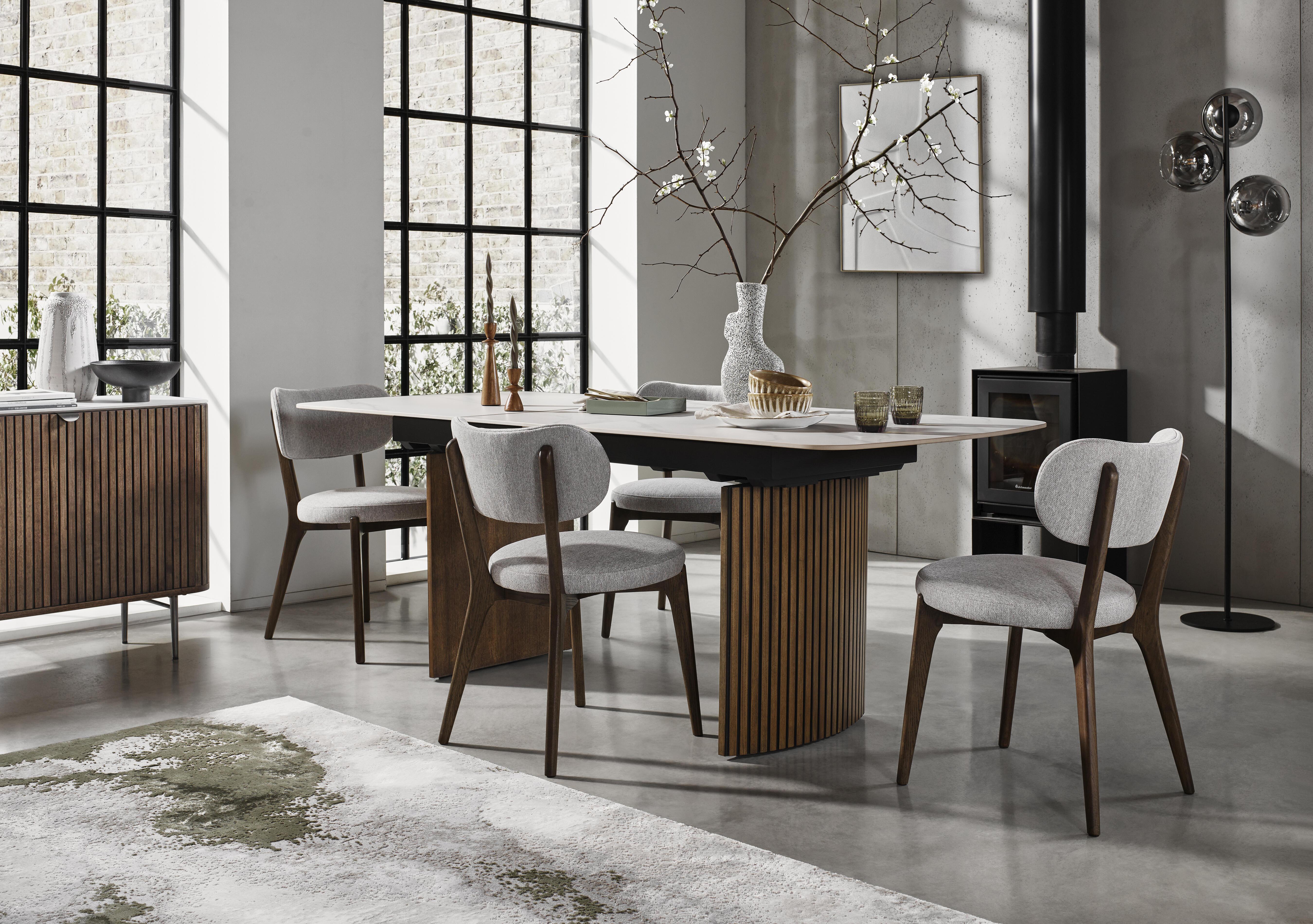 Cortado Pop-Up Extending Dining Table with 6 Wooden Leg Dining Chairs in  on Furniture Village