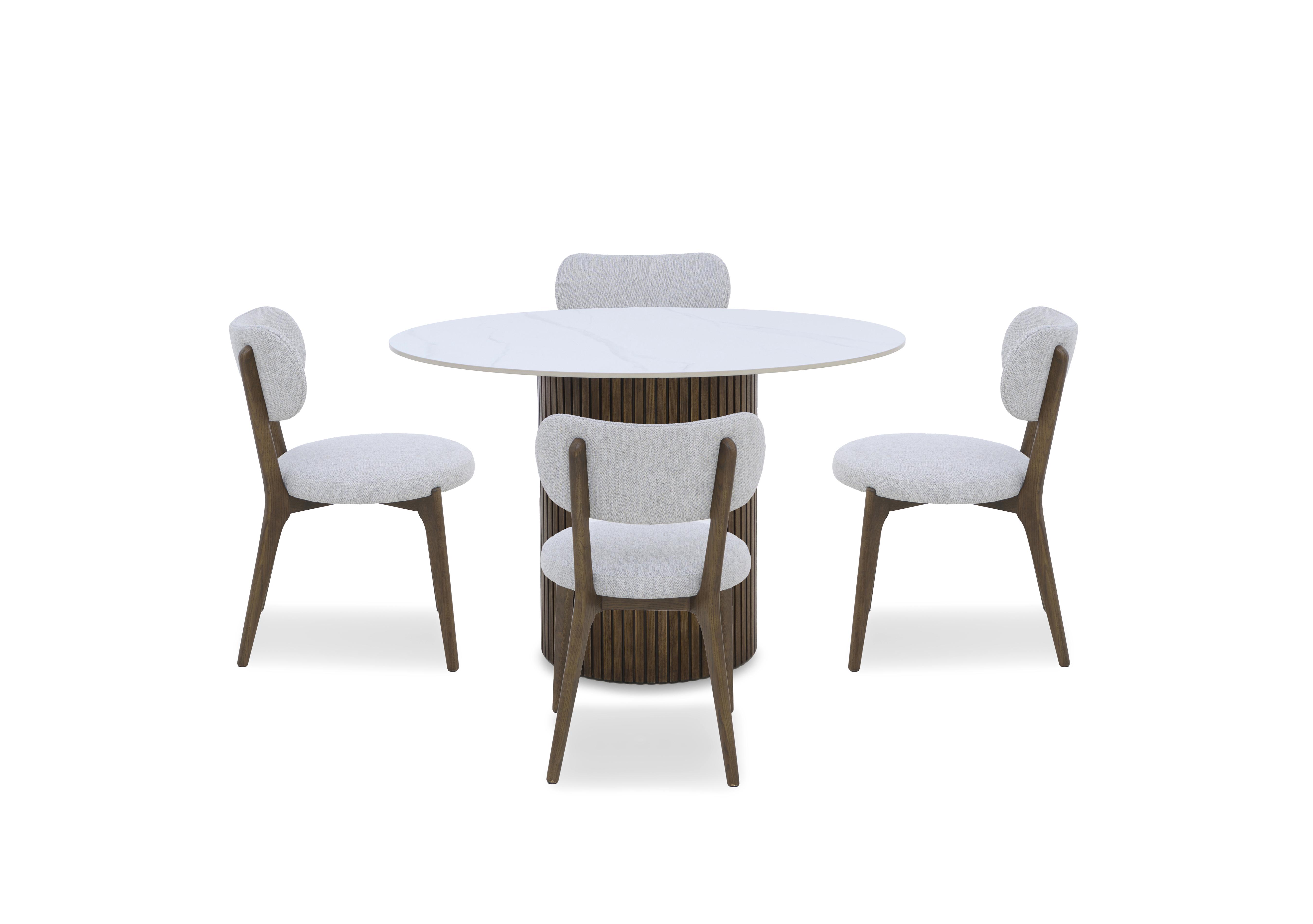 Cortado Round Dining Table with 4 Wooden Leg Dining Chairs in  on Furniture Village