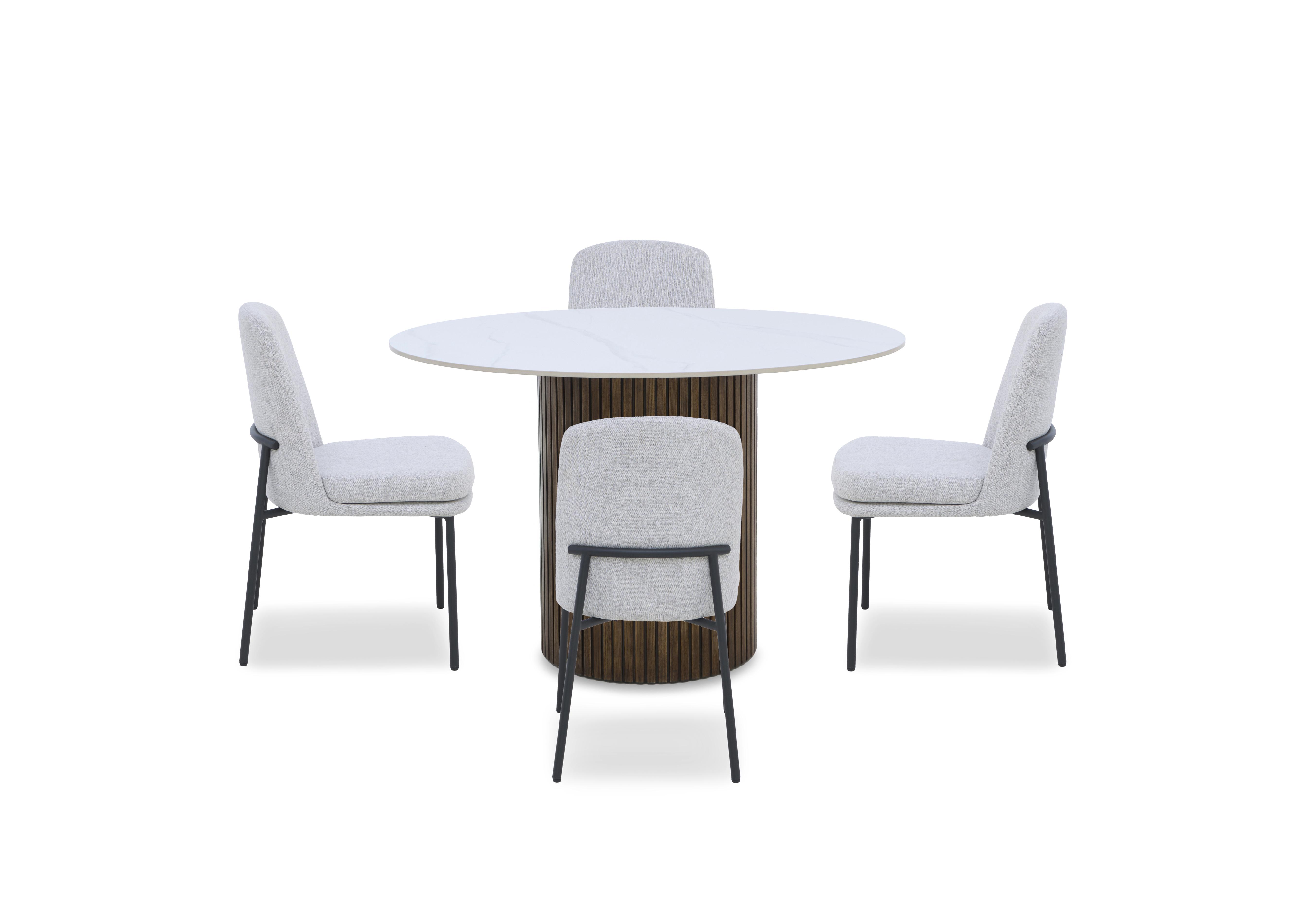 Cortado Round Dining Table with 4 Metal Leg Dining Chairs in  on Furniture Village