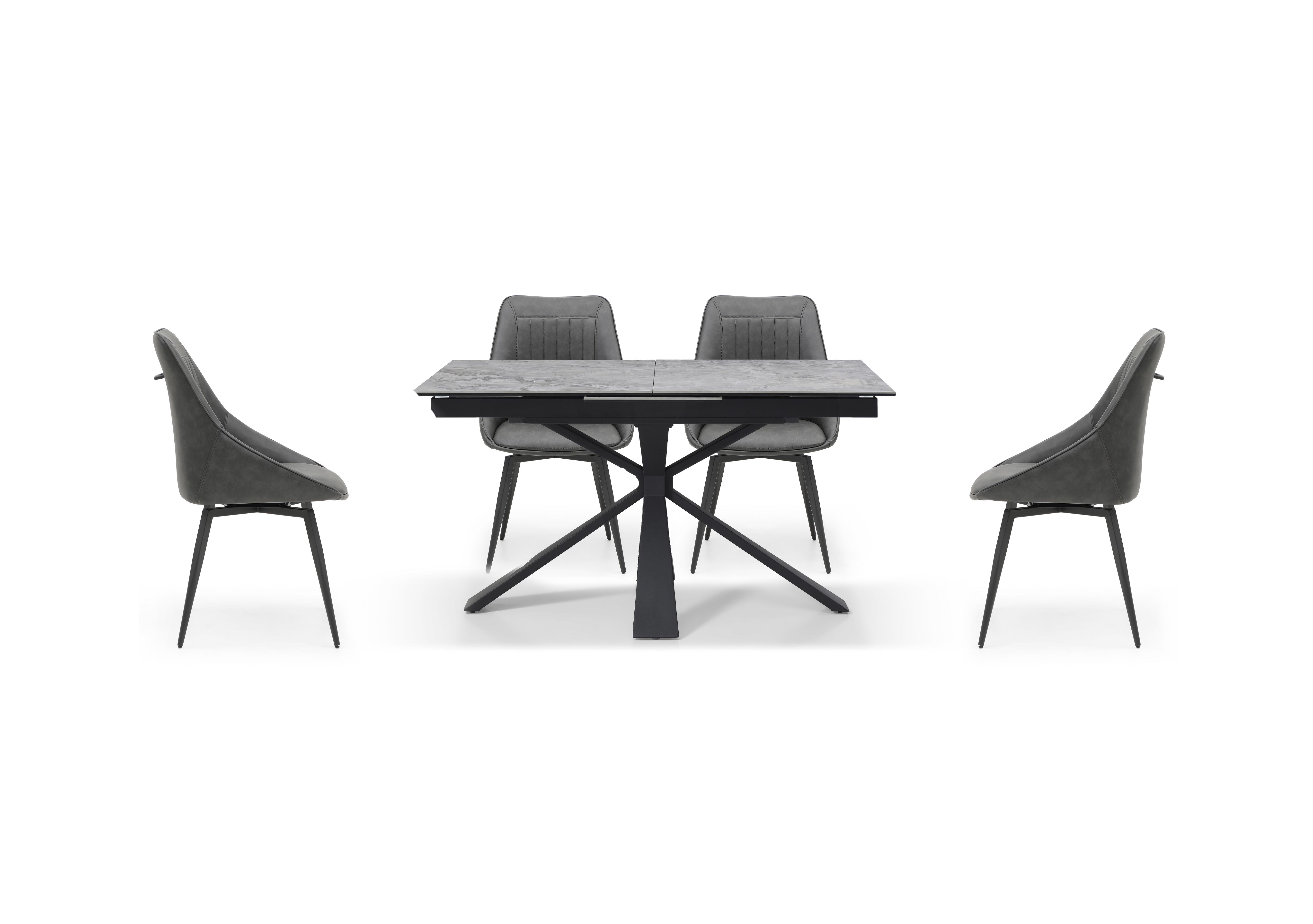 Crete Small Extending Dining Table and 4 Faux Leather Swivel Dining Chairs in  on Furniture Village