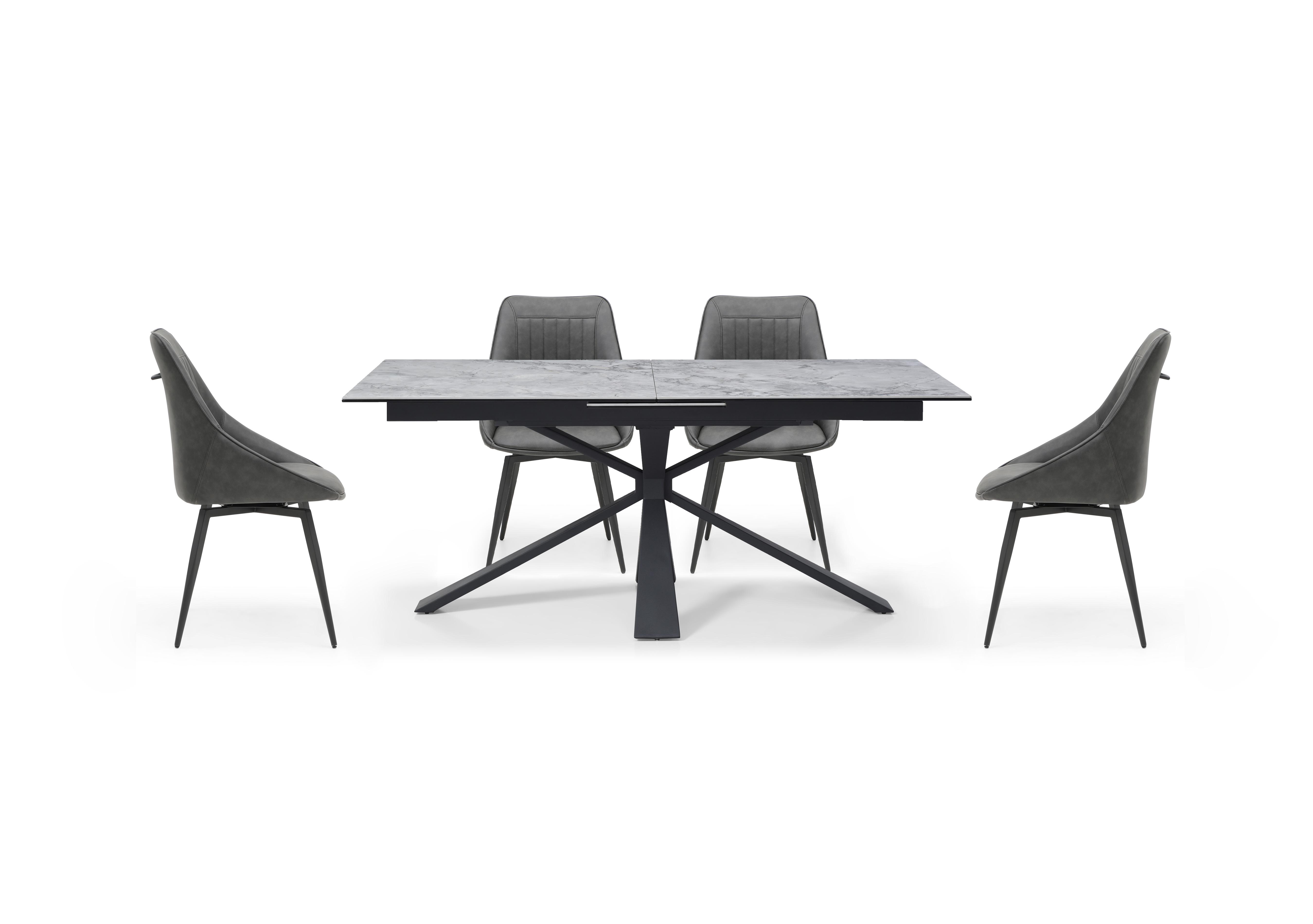 Crete Large Extending Dining Table and 4 Faux Leather Swivel Dining Chairs in  on Furniture Village