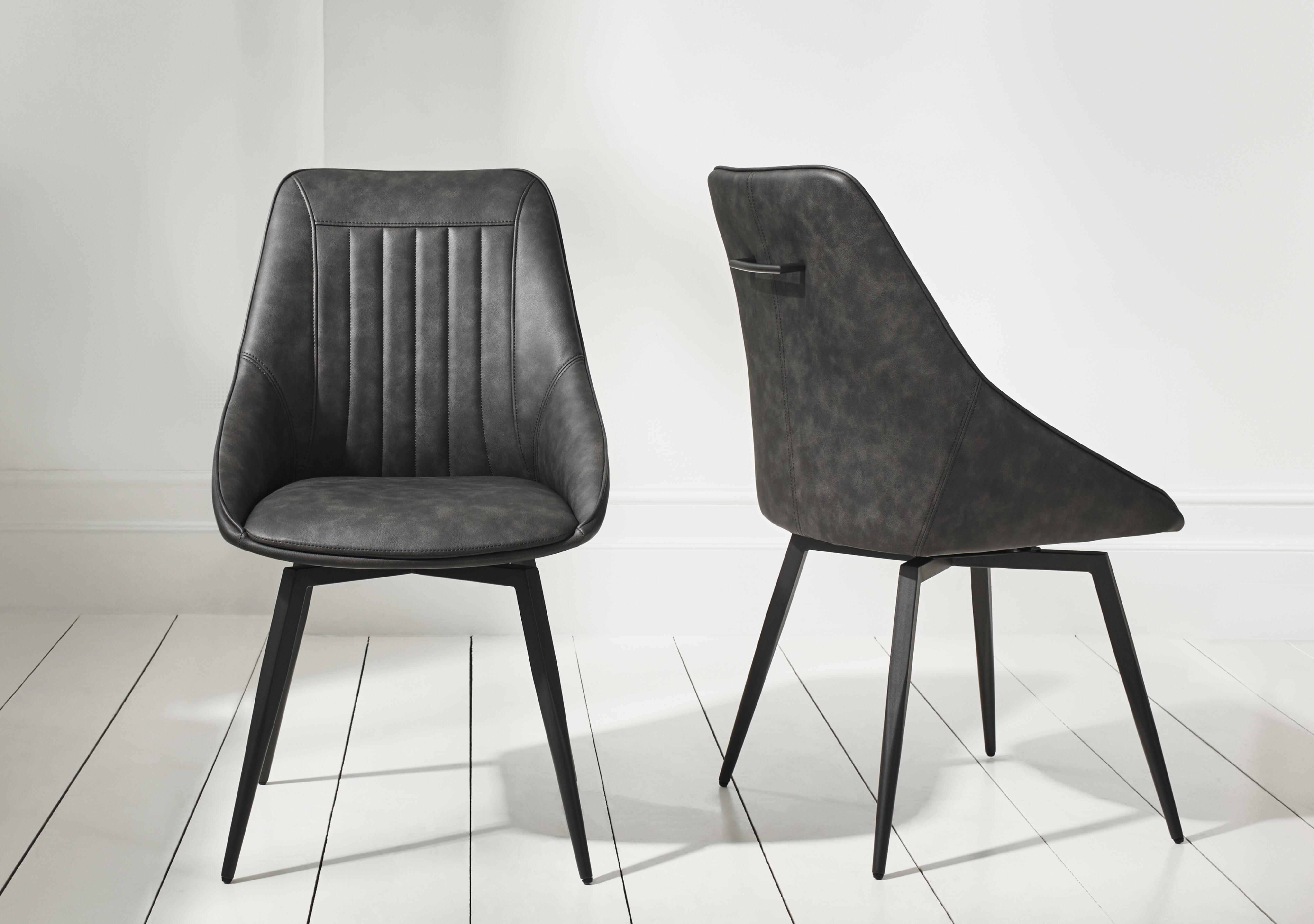 Crete Set of 4 Faux Leather Swivel Dining Chairs in  on Furniture Village