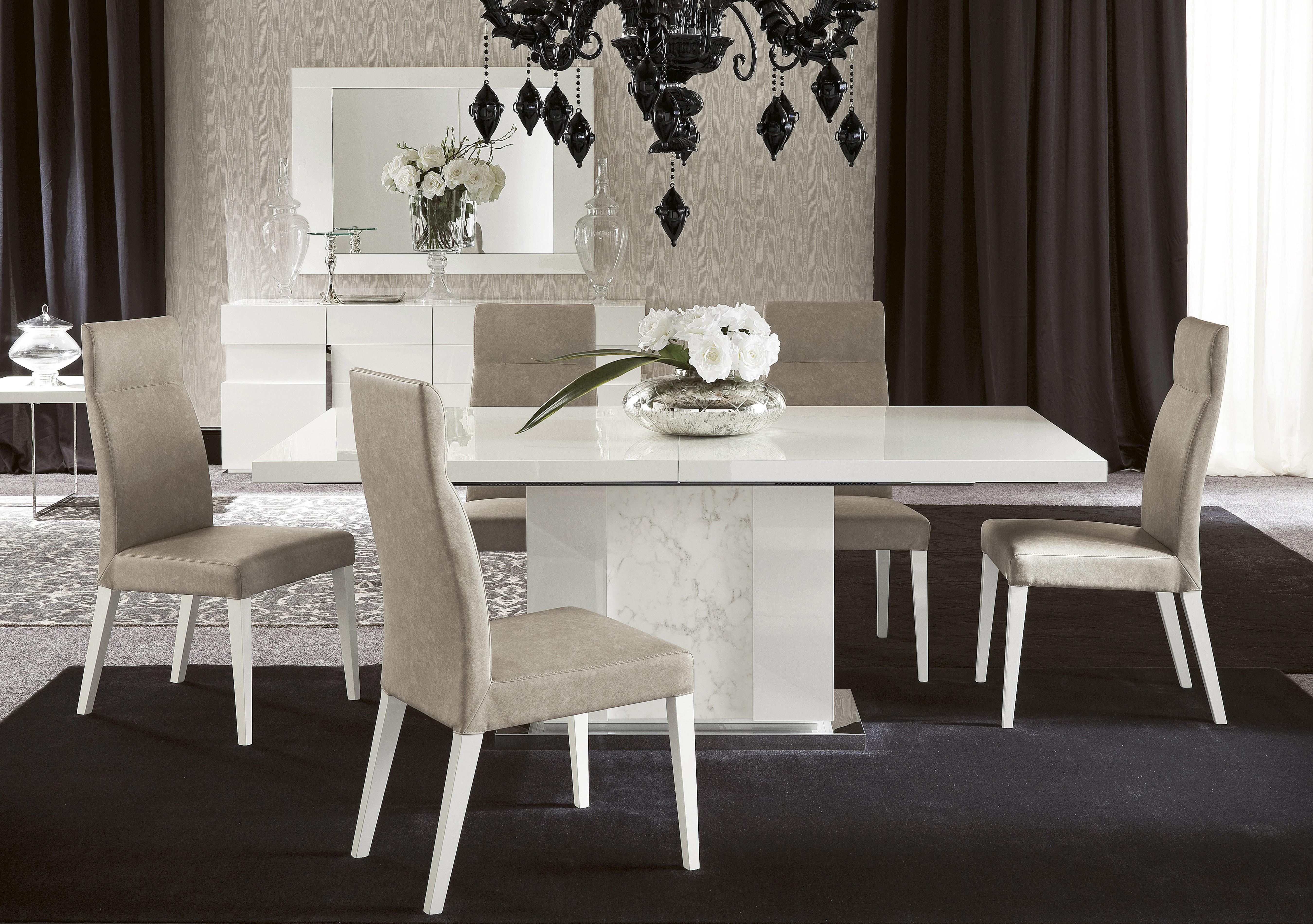 Fascino Extending Dining Table and 6 Faux Leather Dining Chairs in  on Furniture Village
