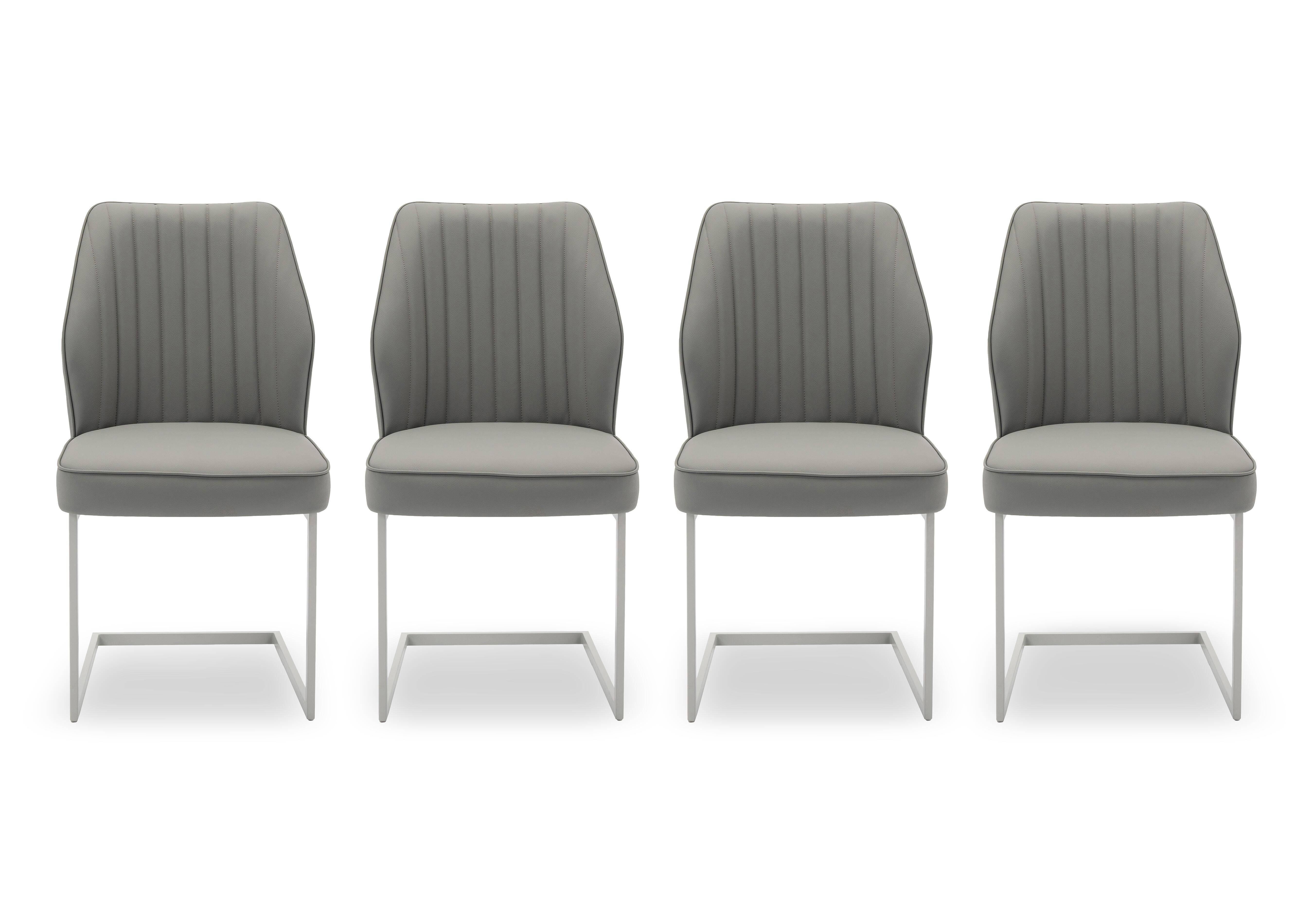 Fumo Set of 4 Faux Leather Cantilever Dining Chairs in  on Furniture Village