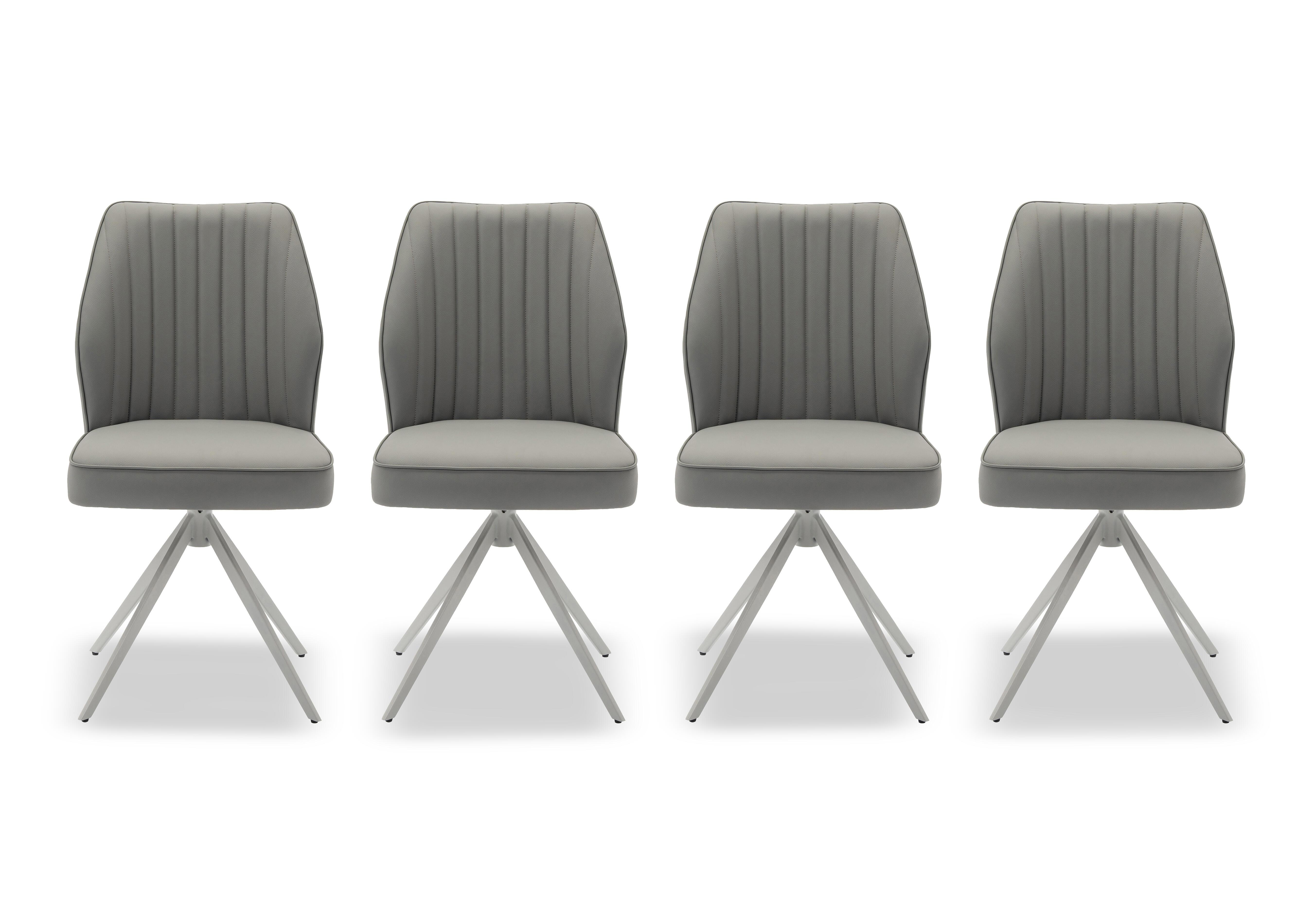 Fumo Set of 4 Faux Leather Swivel Dining Chairs in  on Furniture Village