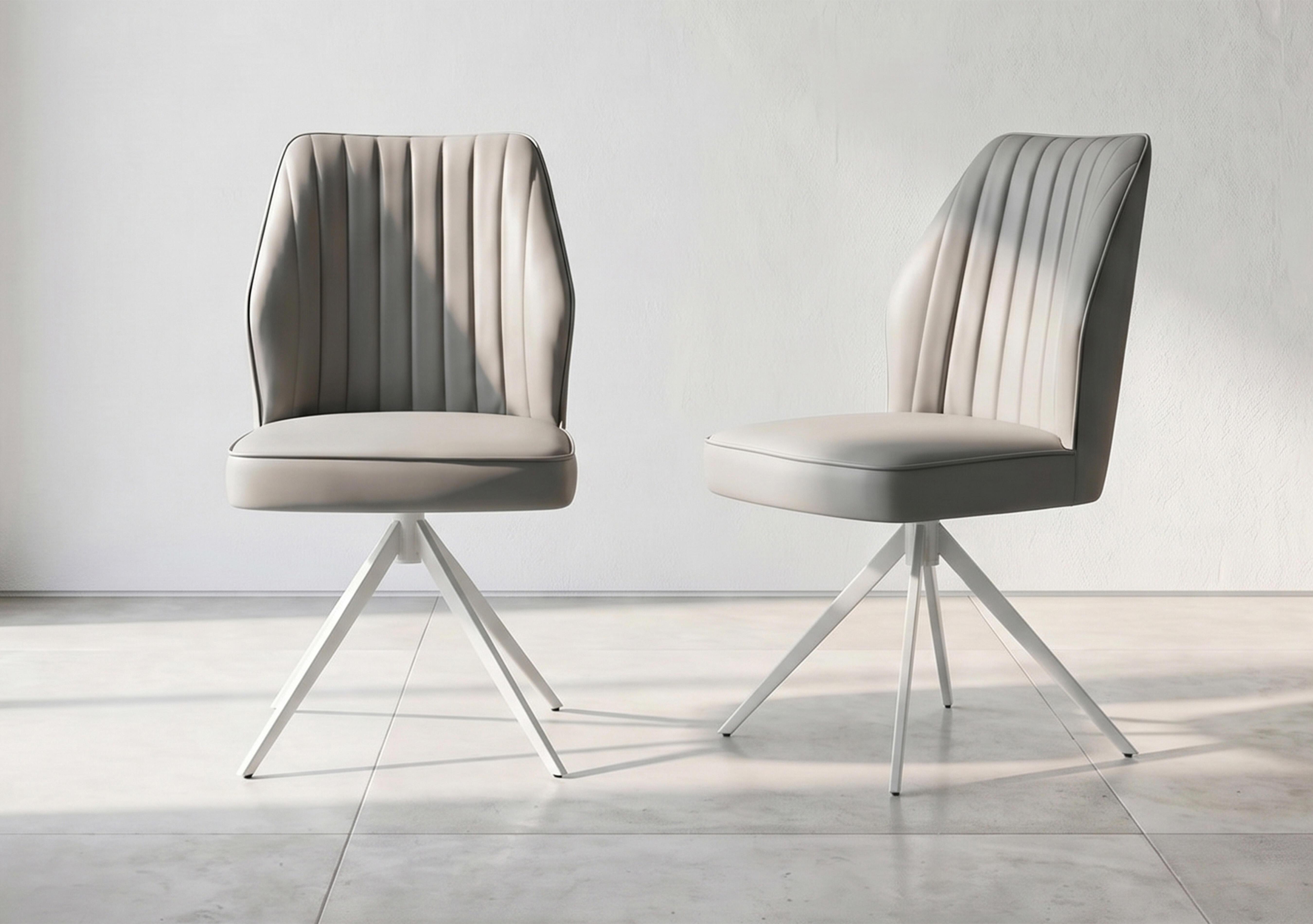 Fumo Set of 4 Faux Leather Swivel Dining Chairs in  on Furniture Village