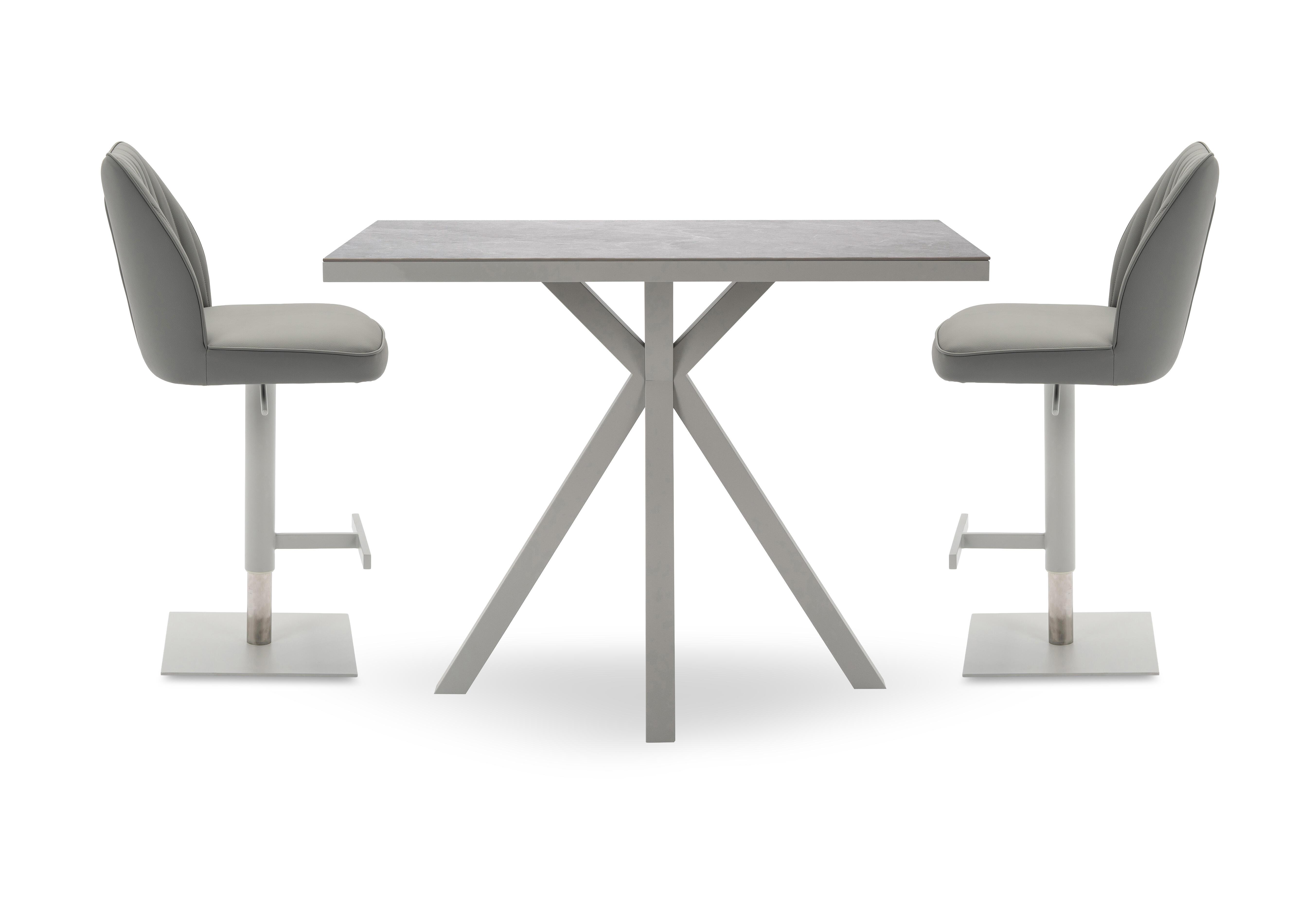 Fumo Bar Table and 2 Faux Leather Swivel Bar Stools in  on Furniture Village