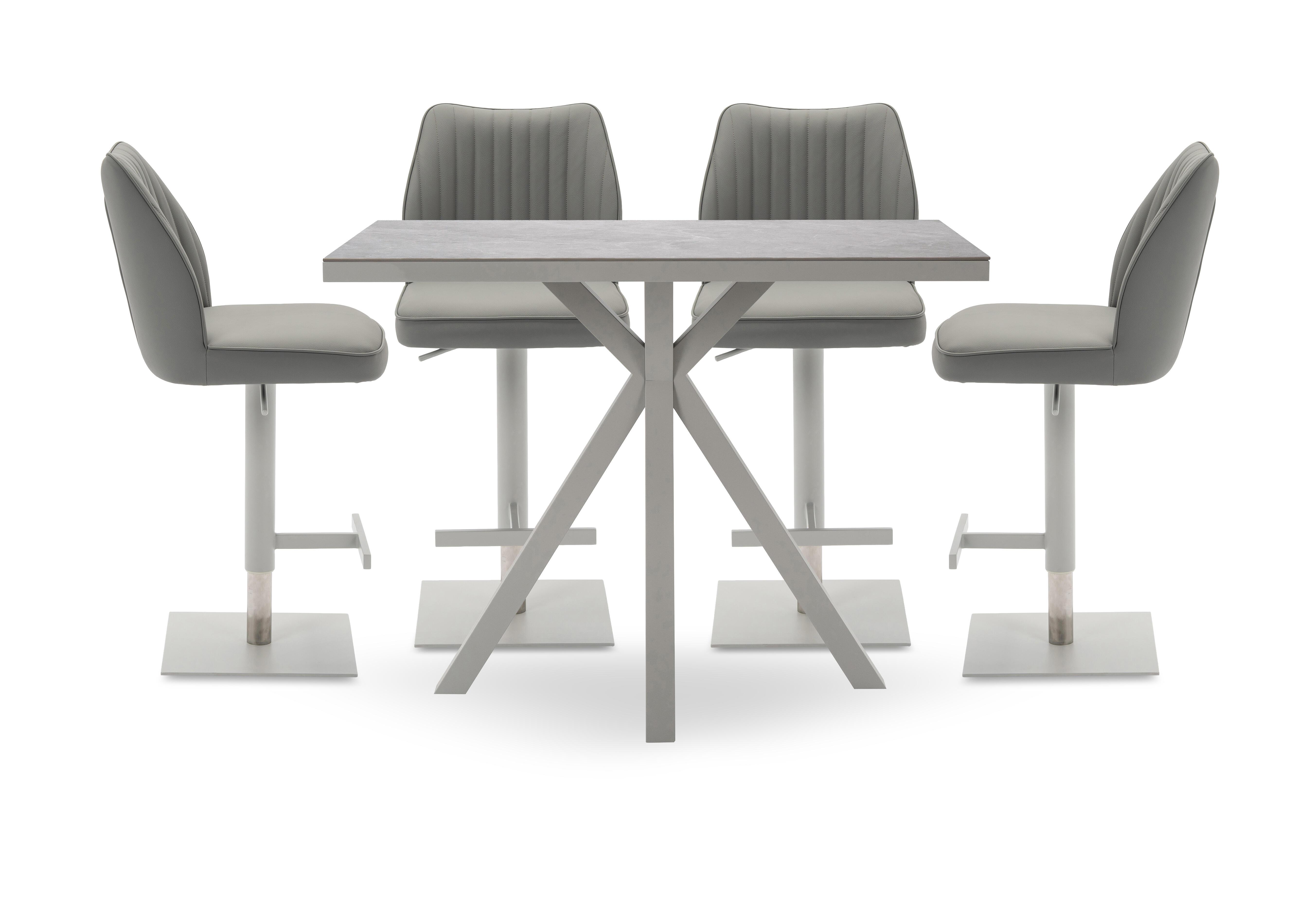 Fumo Bar Table and 4 Faux Leather Swivel Bar Stools in  on Furniture Village