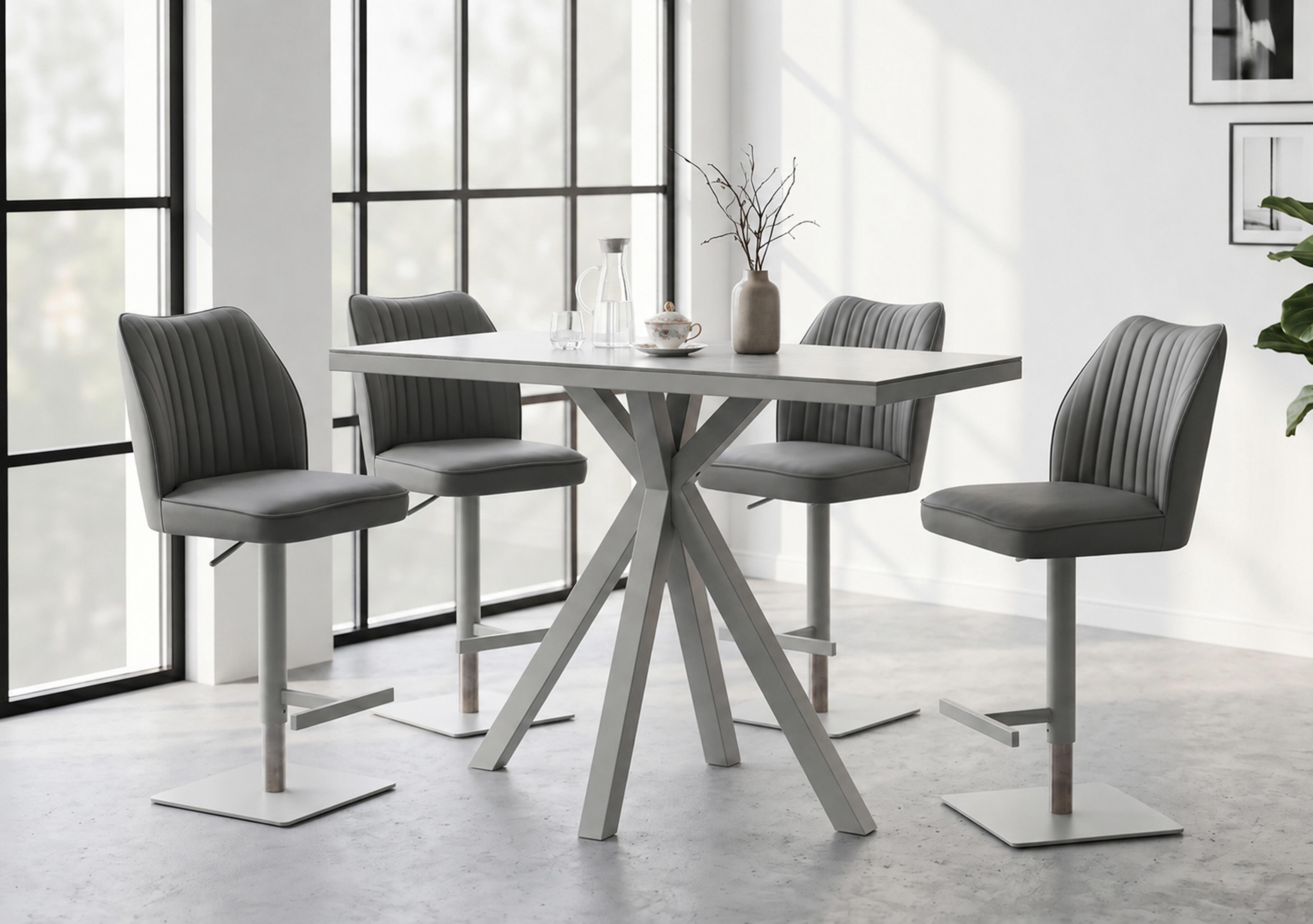 Fumo Bar Table and 4 Faux Leather Swivel Bar Stools in  on Furniture Village