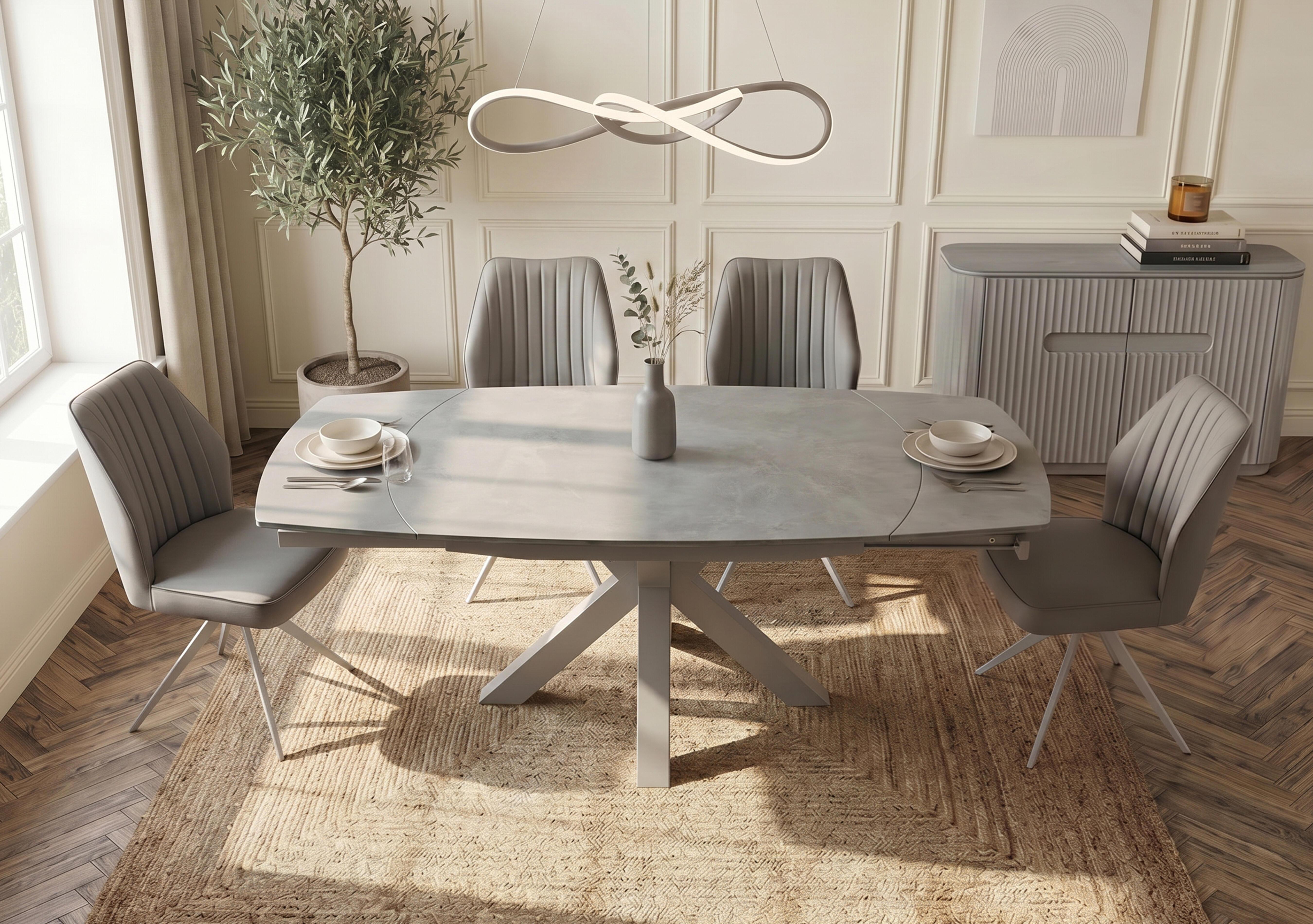 Fumo Swivel Extending Dining Table in  on Furniture Village