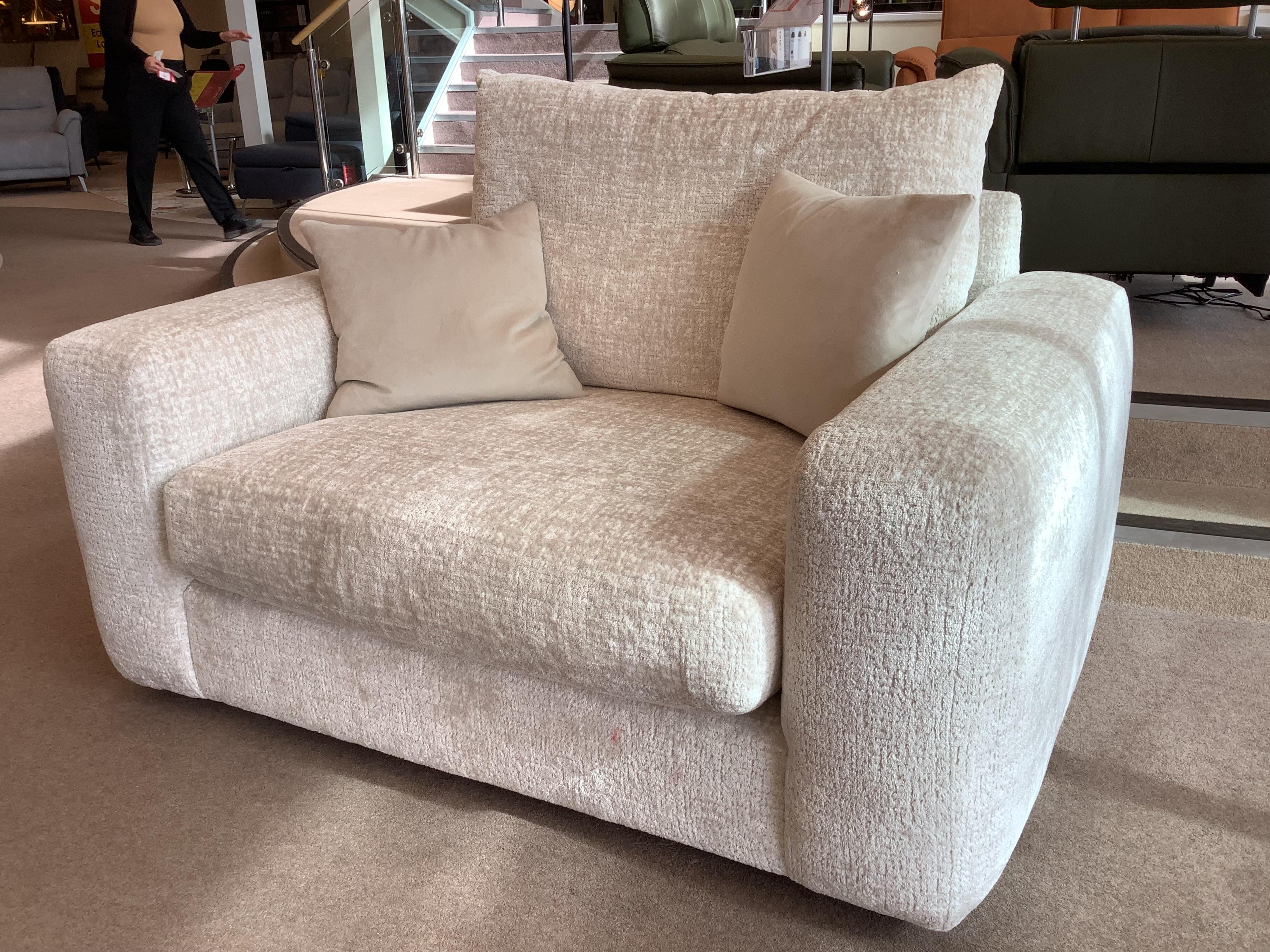 Pandora snuggler chair with Rug in  on Furniture Village
