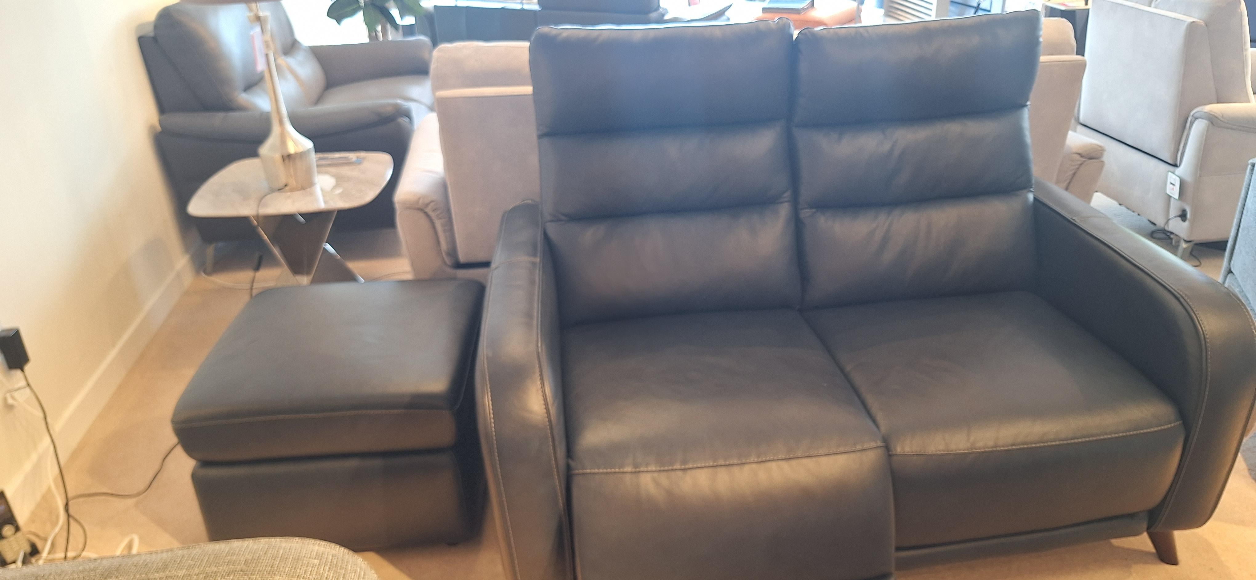 Quinn 2 seater power sofa and footstool in  on Furniture Village