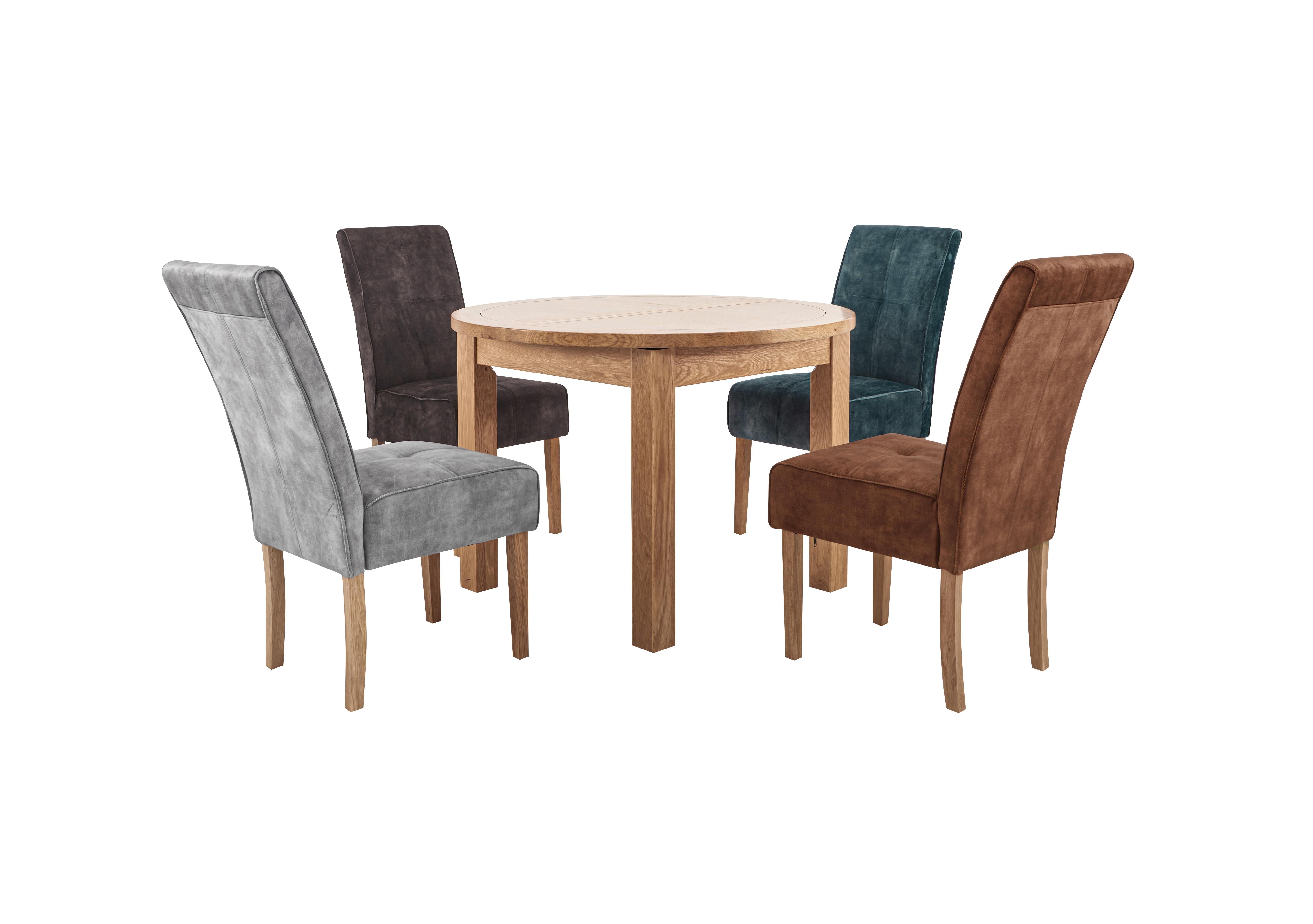 California Round Extending Table With Multi Coloured Chairs in  on Furniture Village