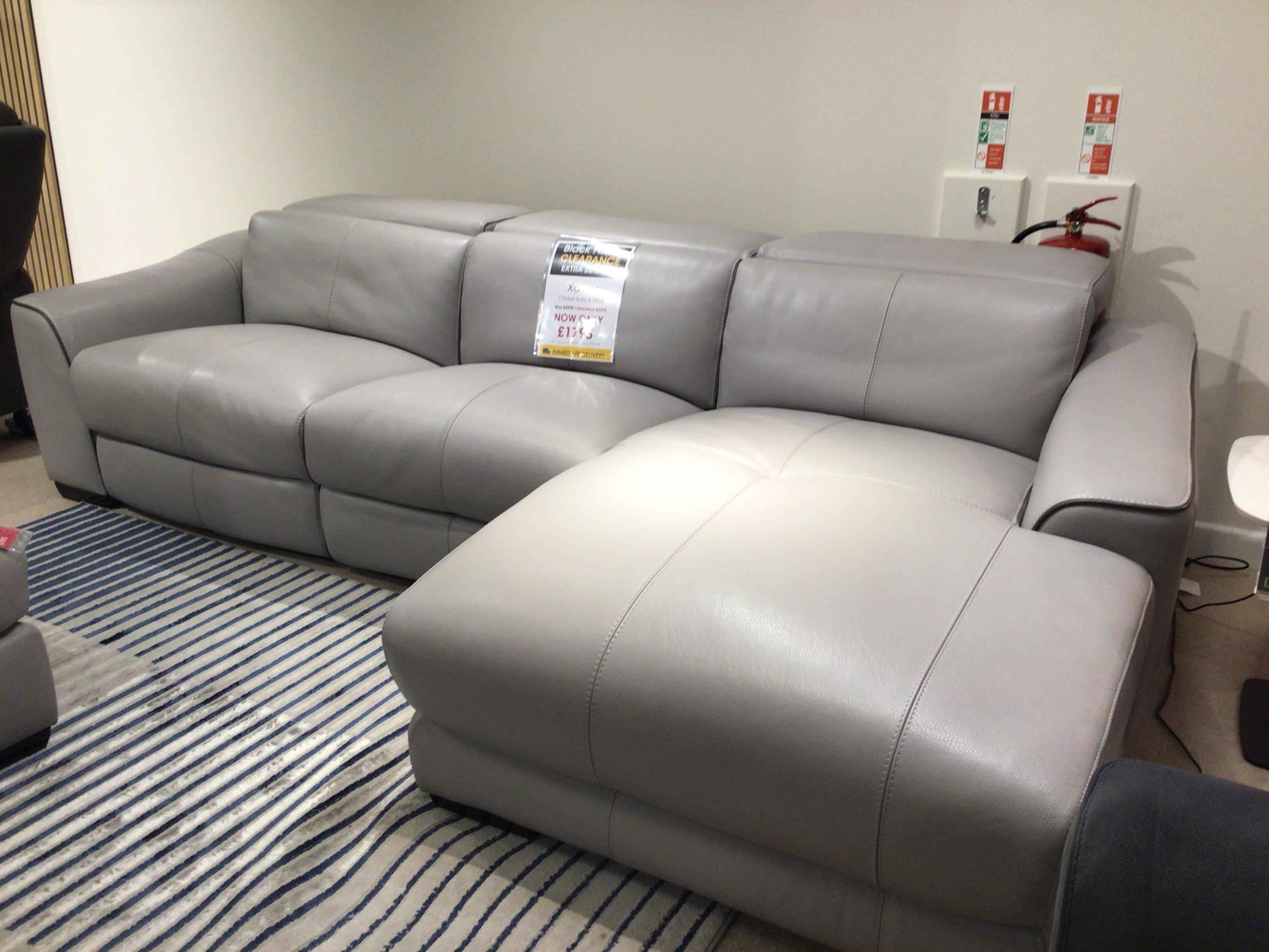 Xavier RHF power reclining chaise sofa and matching footstool in  on Furniture Village