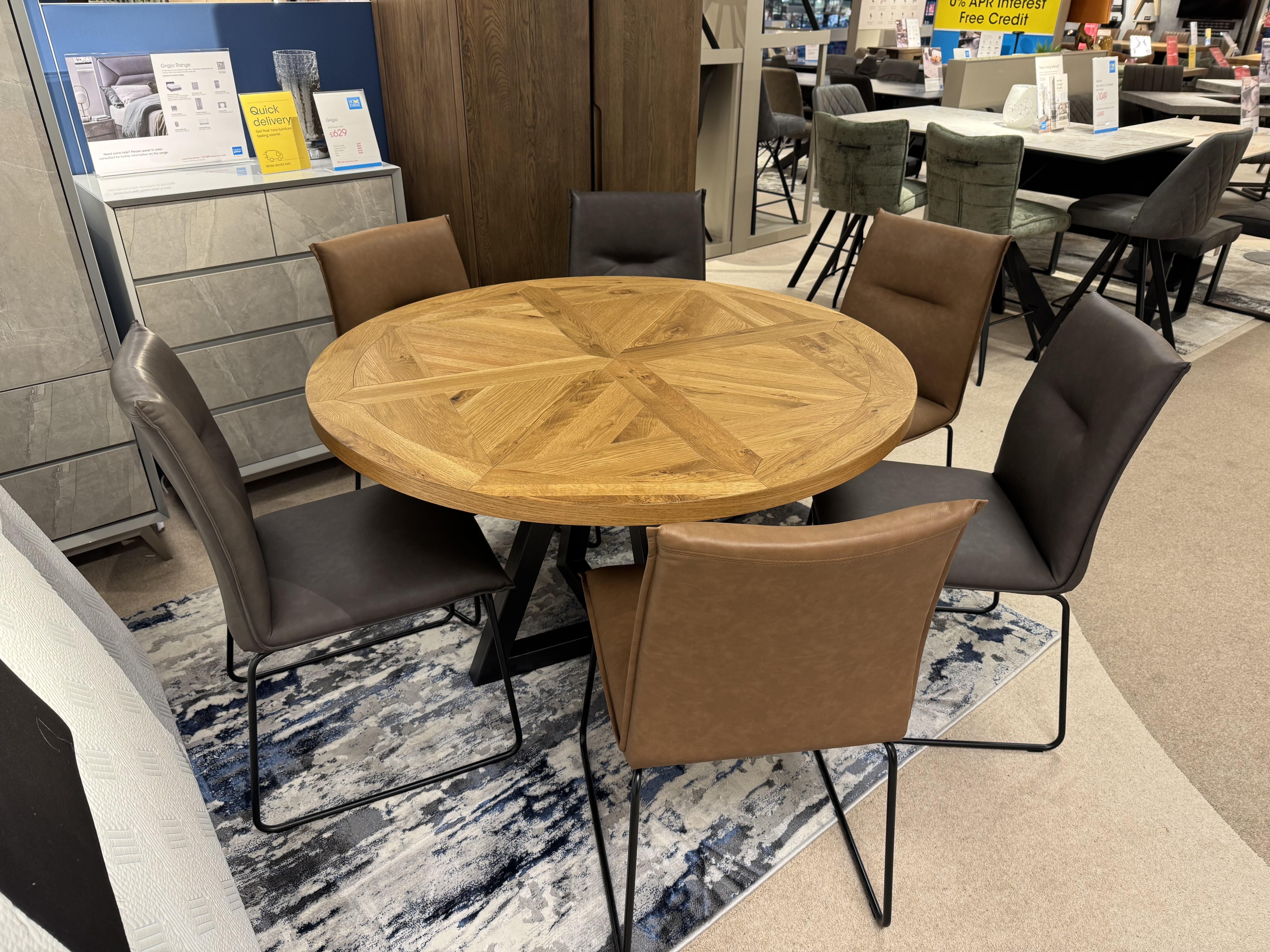 Globe Round Dining Table & 6 Gate Chairs in  on Furniture Village