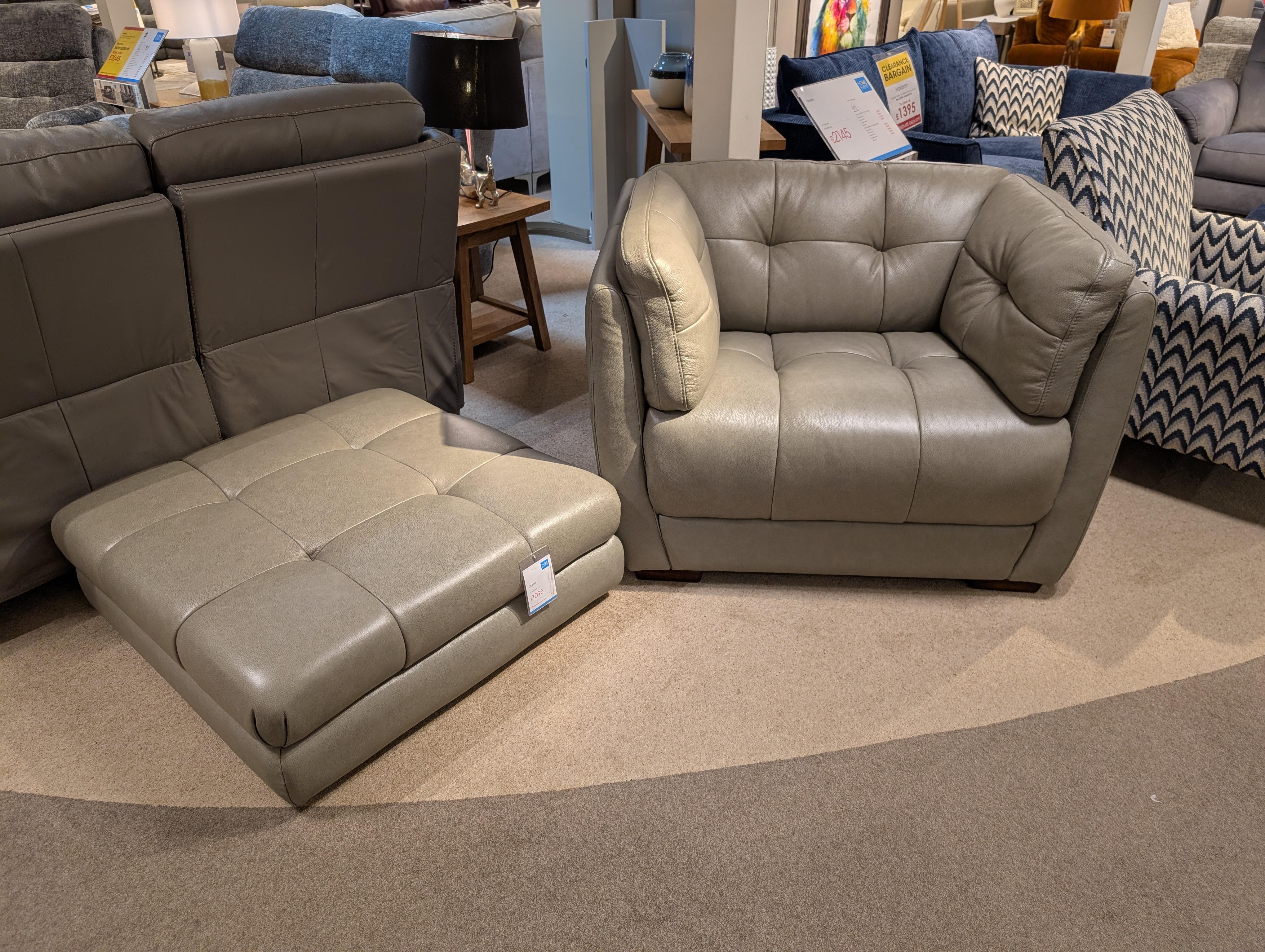 Cartier snuggles chair and footstool in  on Furniture Village