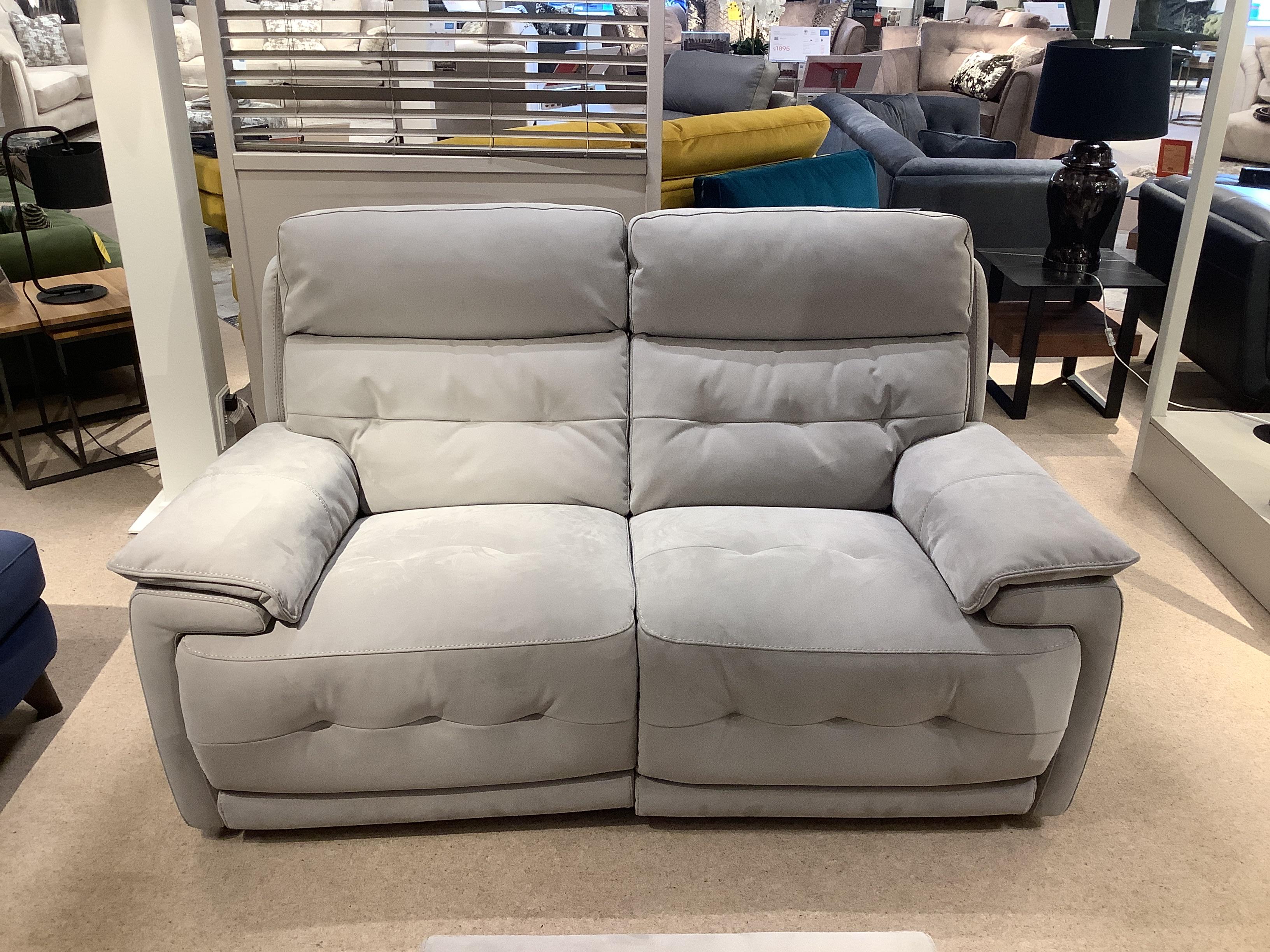 Brescia 2 seater power sofa and stool in  on Furniture Village