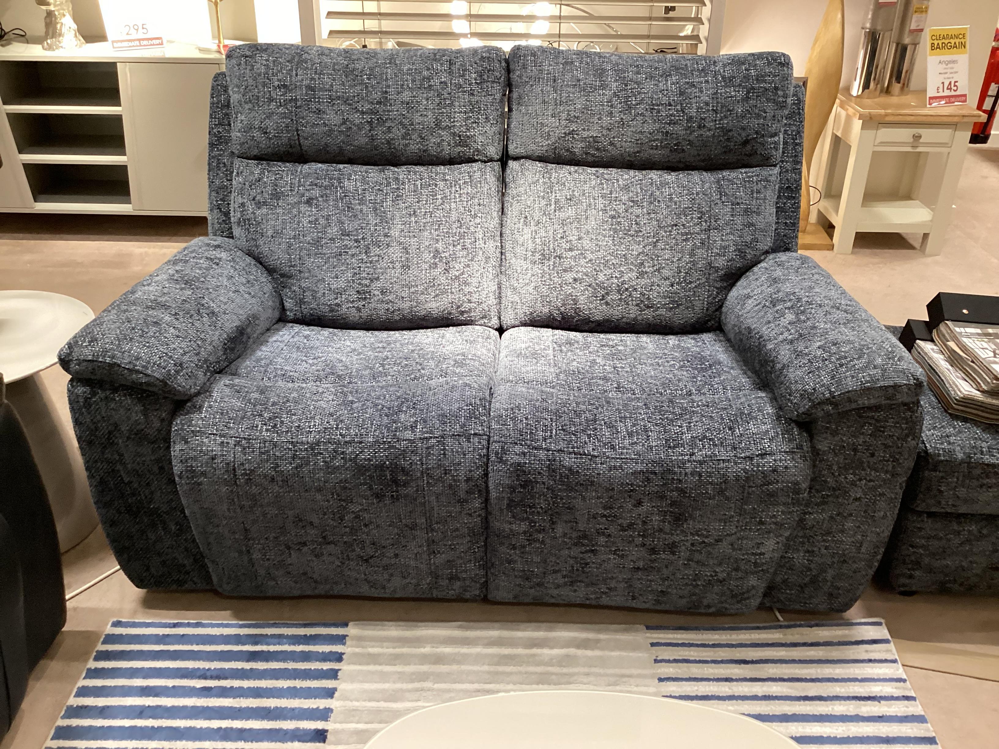 Aero 2 Seater Power Recliner Sofa and Storage Stool in  on Furniture Village