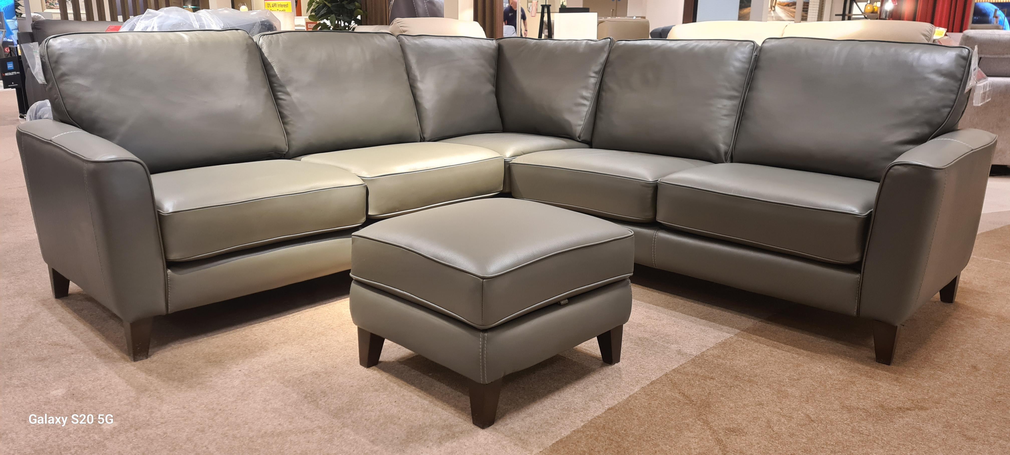 Brondby large leather corner and storage stool in  on Furniture Village