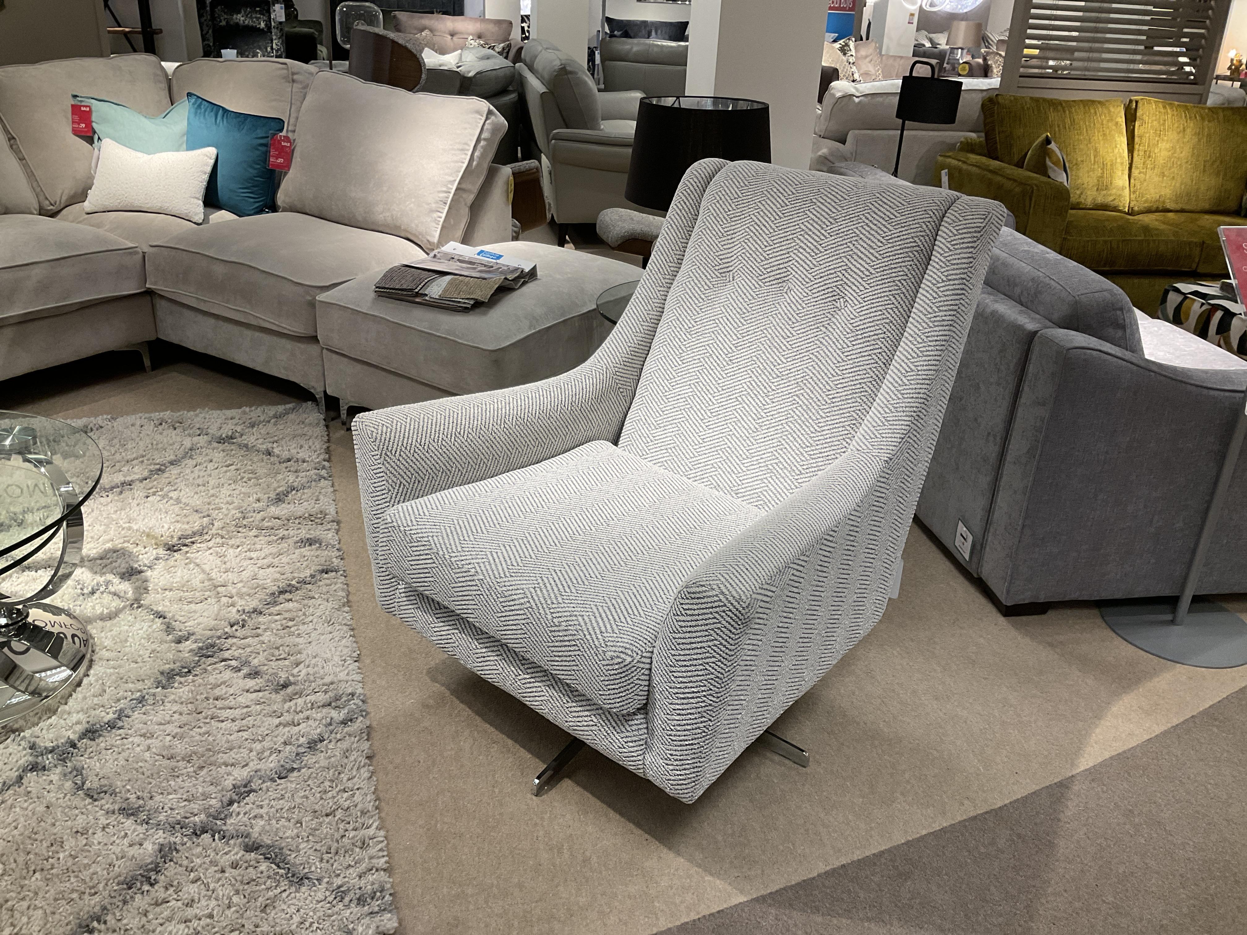 Legend Fabric Designer Swivel Chair in  on Furniture Village