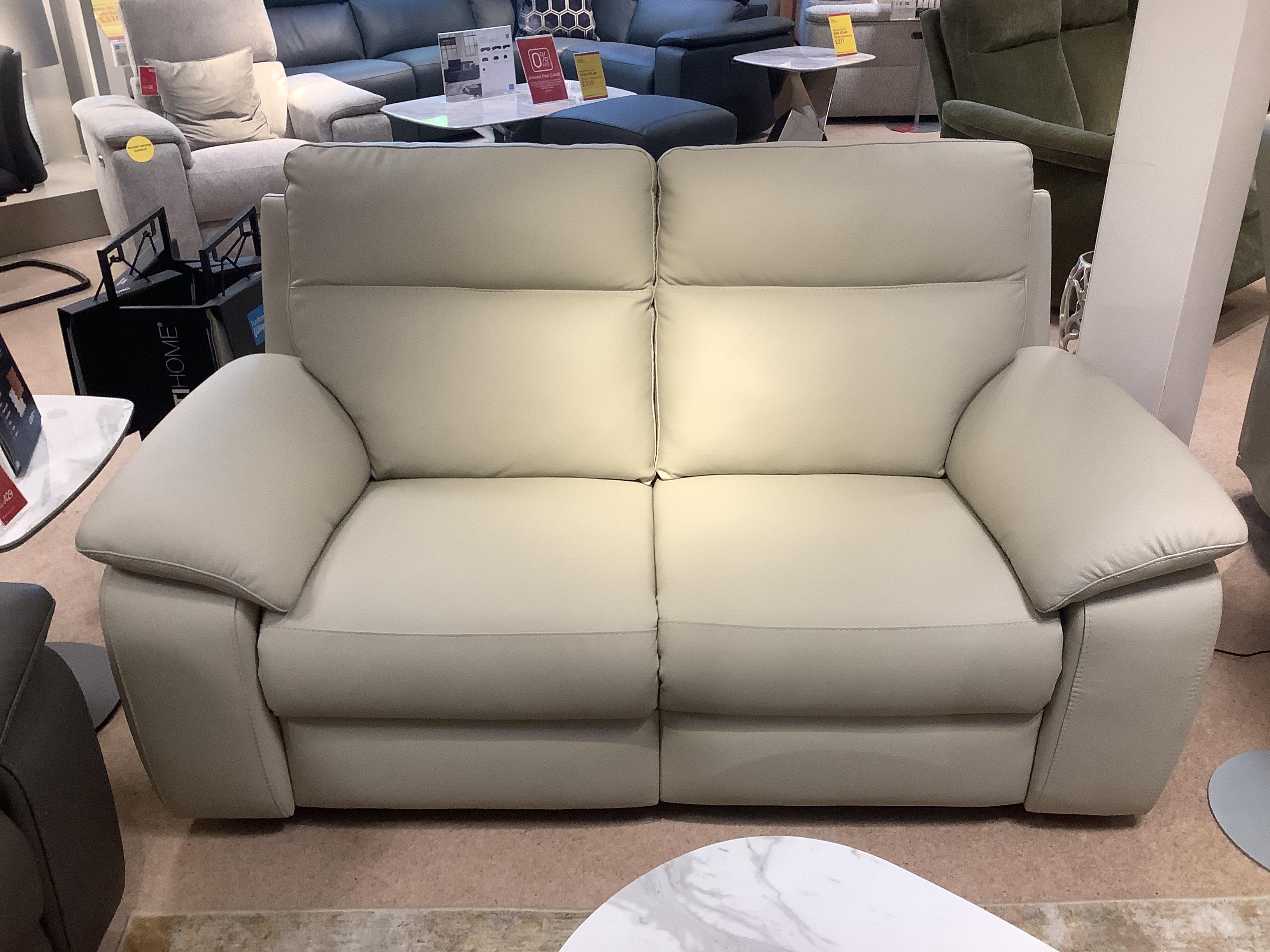 Pepino 2 seater power recliner & storage footstool in  on Furniture Village