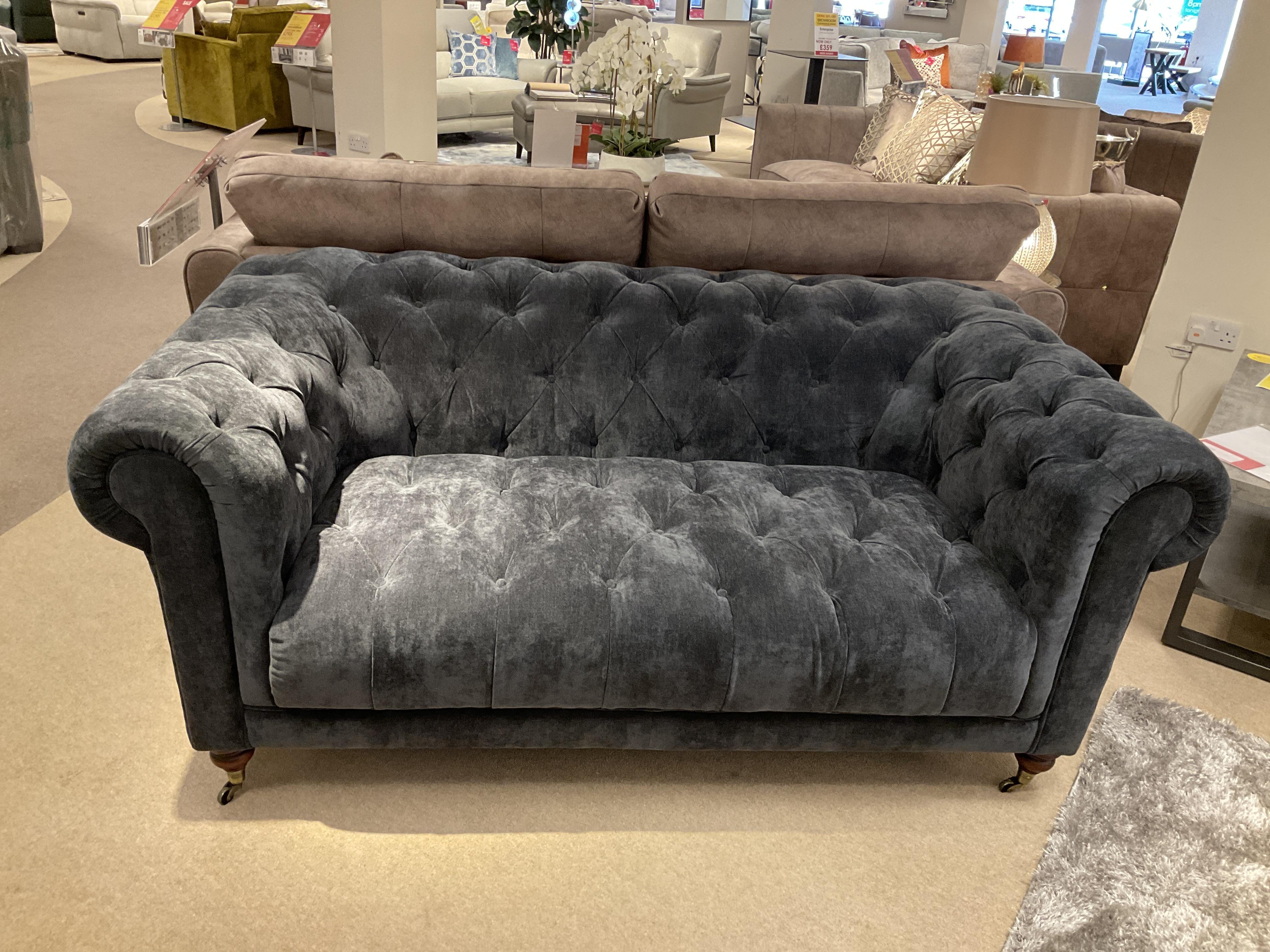 Columbus Fabric 2 Seater Sofa with Castors in  on Furniture Village