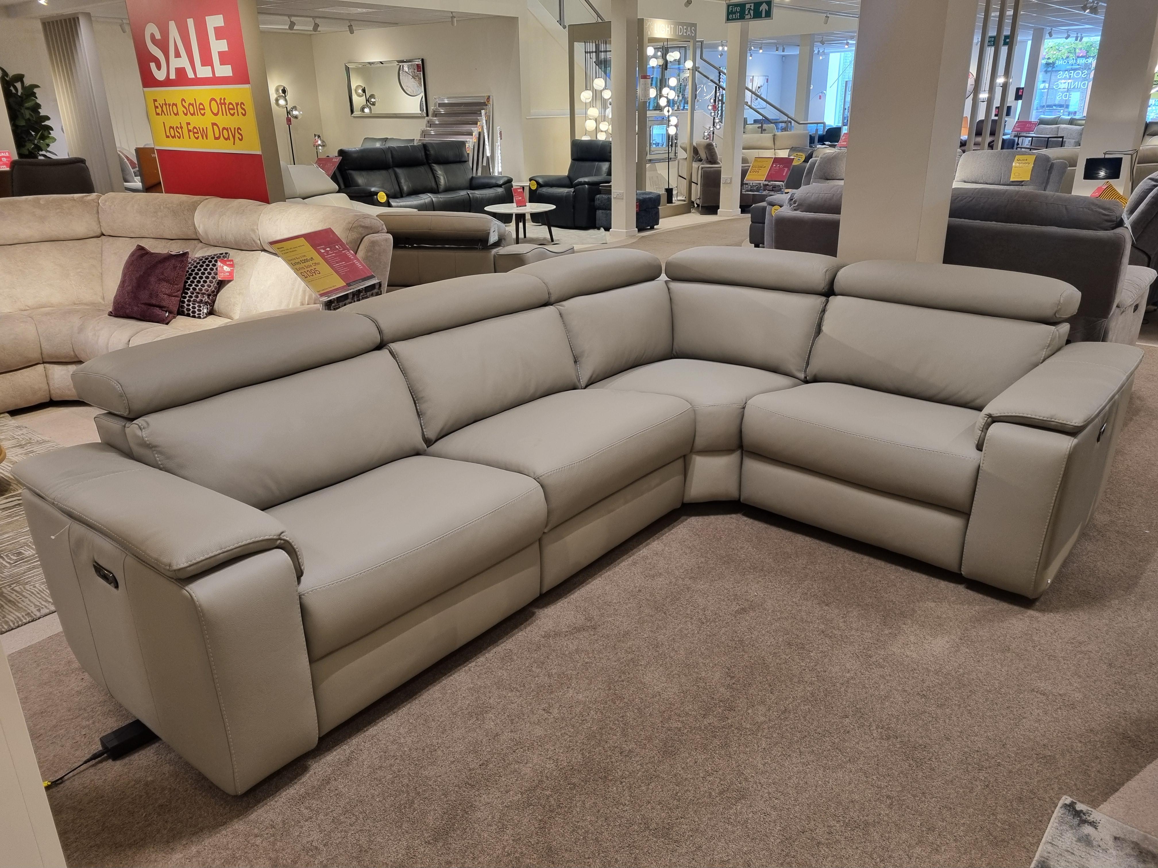Davide Small Leather Corner Power Recliner Sofa & footstool in  on Furniture Village