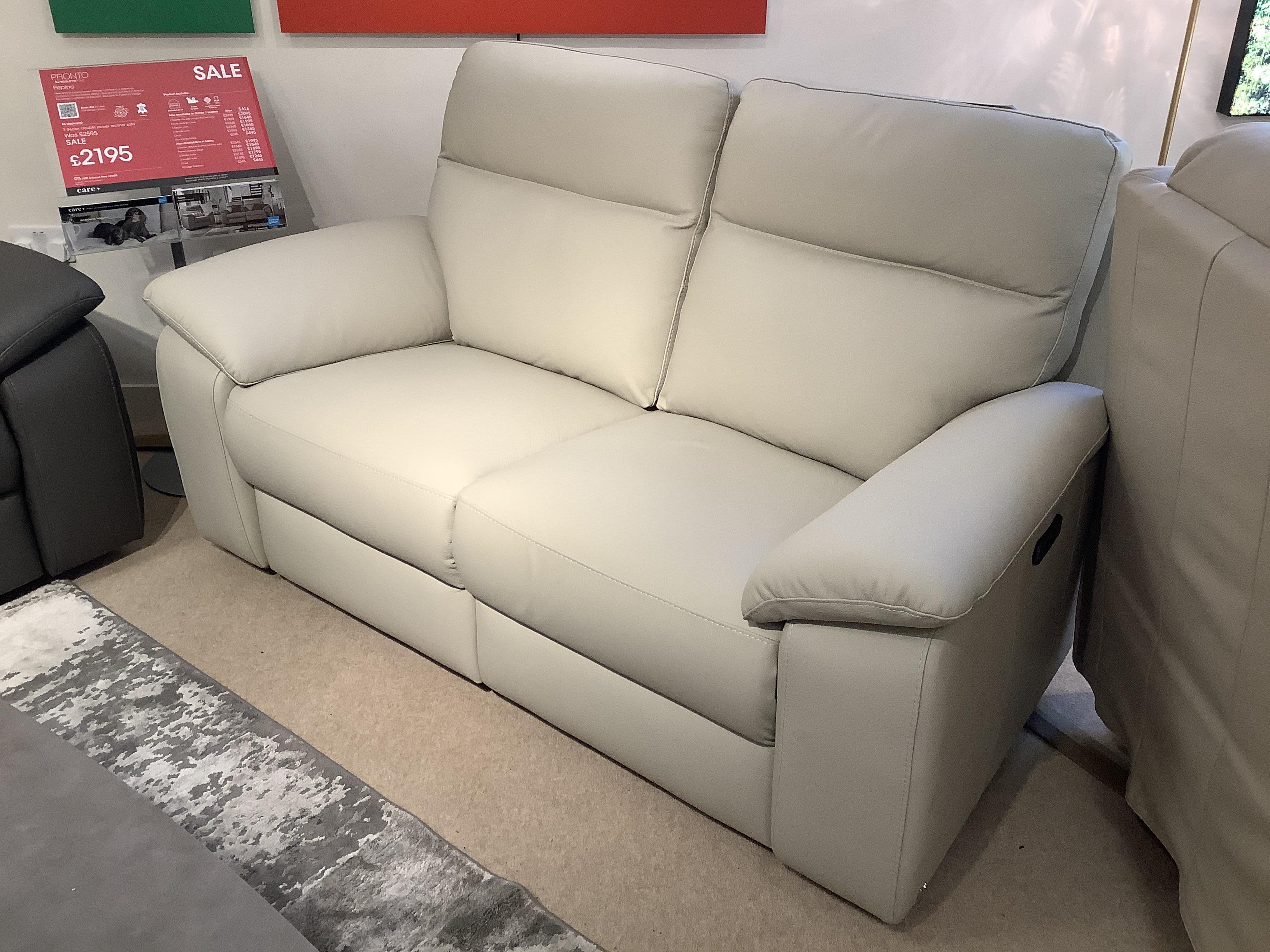 Pepino 2 Seater Power Sofa + Stool in  on Furniture Village
