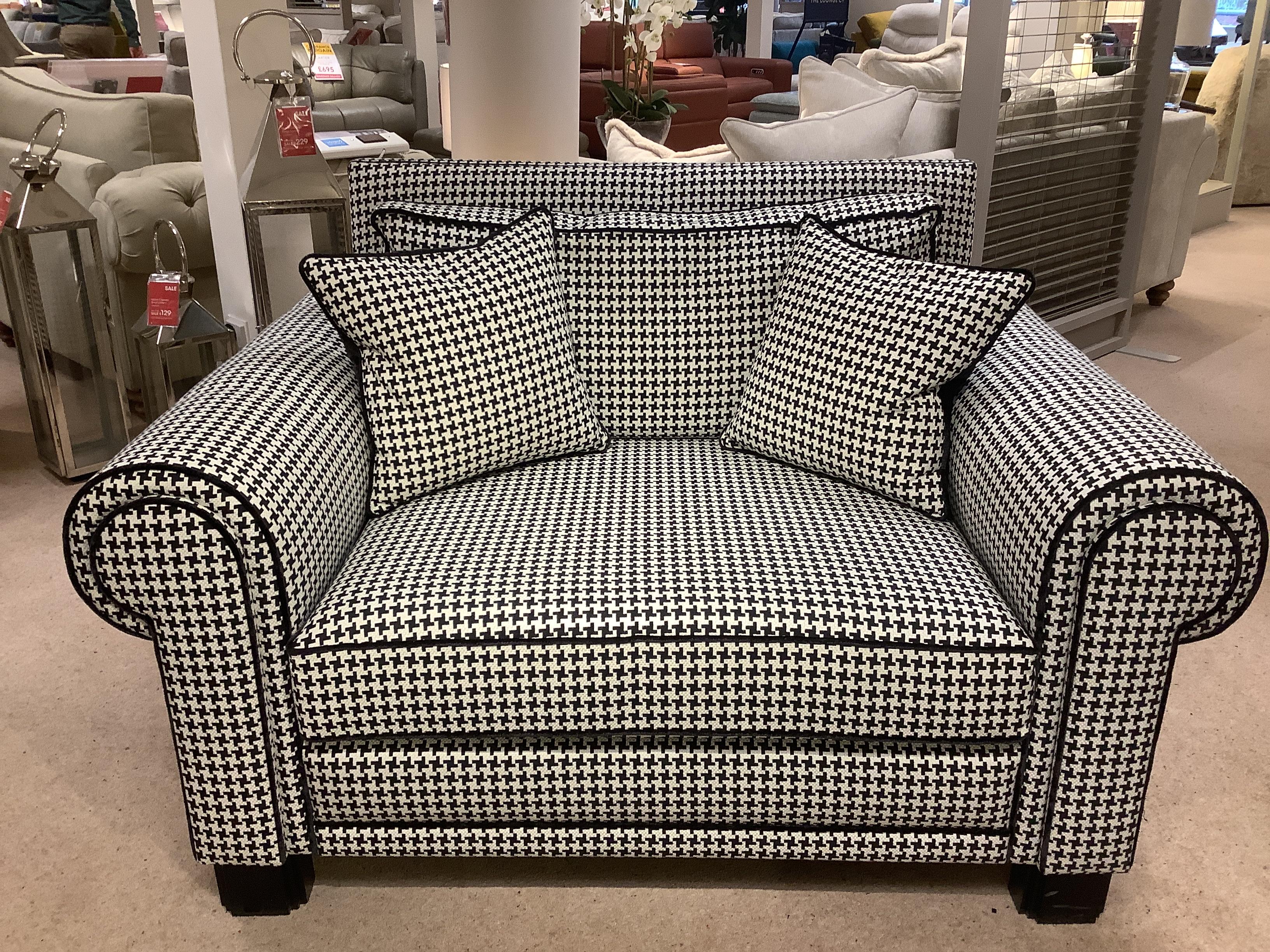 Ambassador Snuggler & Footstool in  on Furniture Village