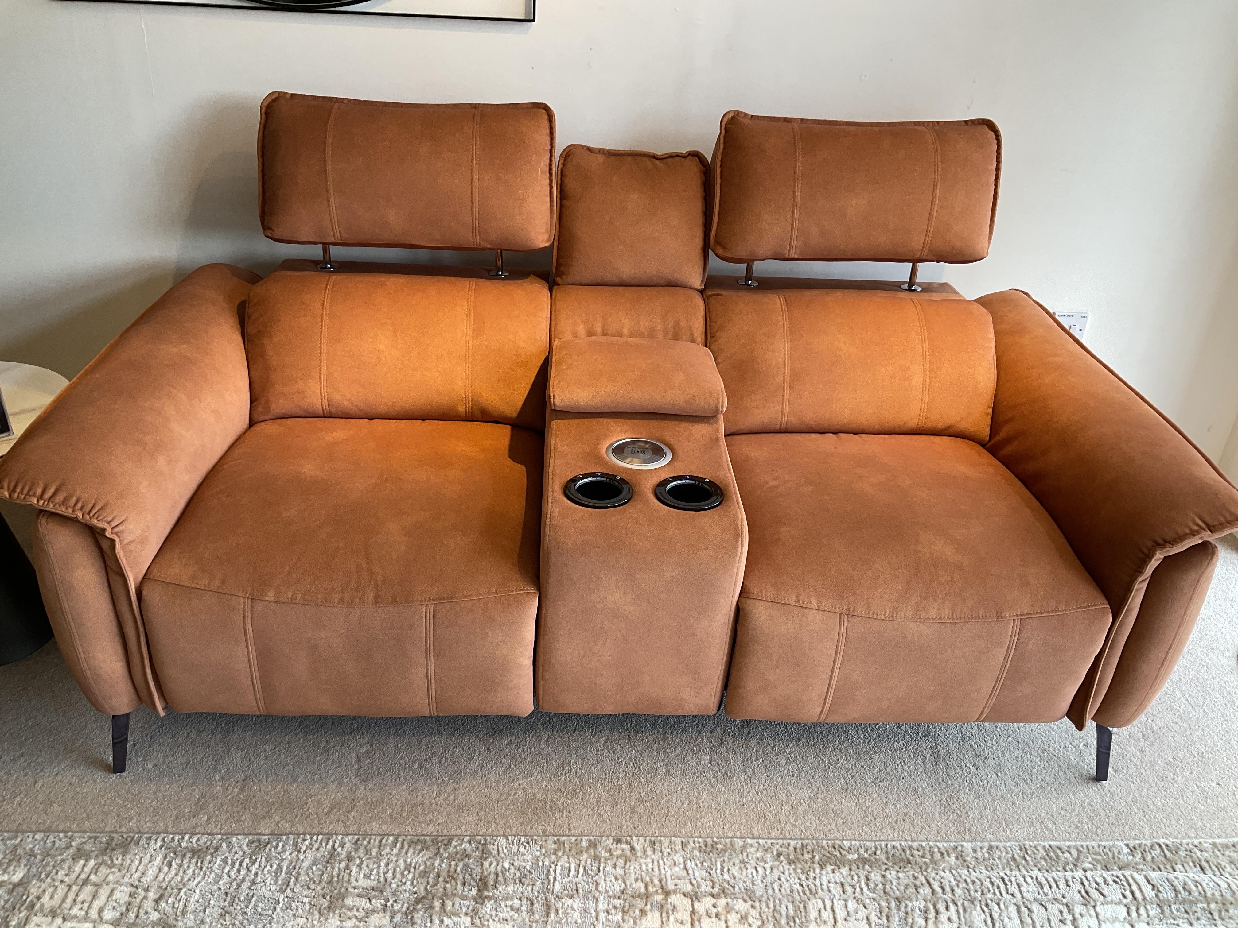 Jude 2 Seater Fabric Power Recliner Sofa with Smart Console Unit and Power Telescopic Headrests & Jude Storage Footsstool in  on Furniture Village