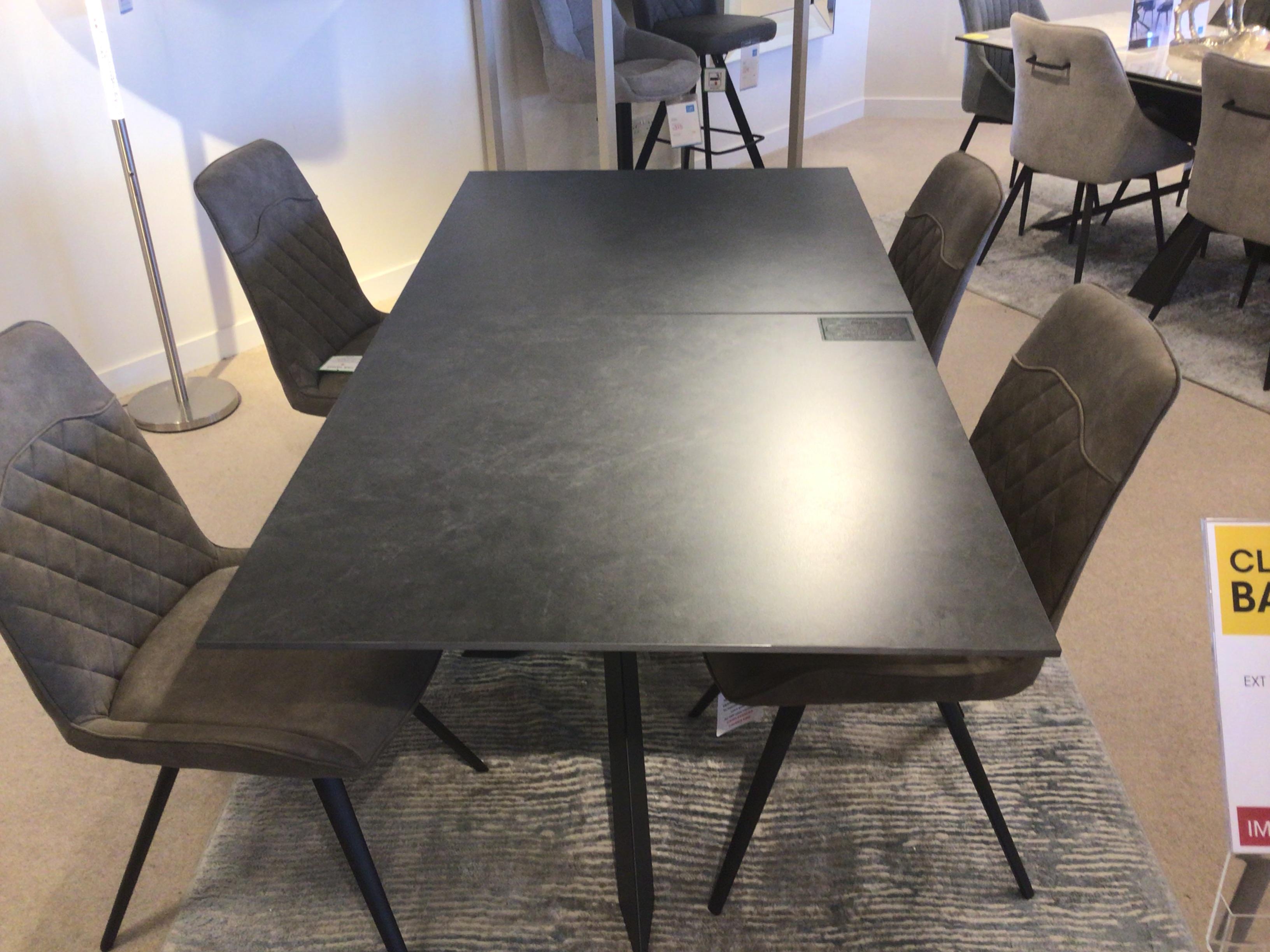 Warrior extending table and 4 chairs in  on Furniture Village