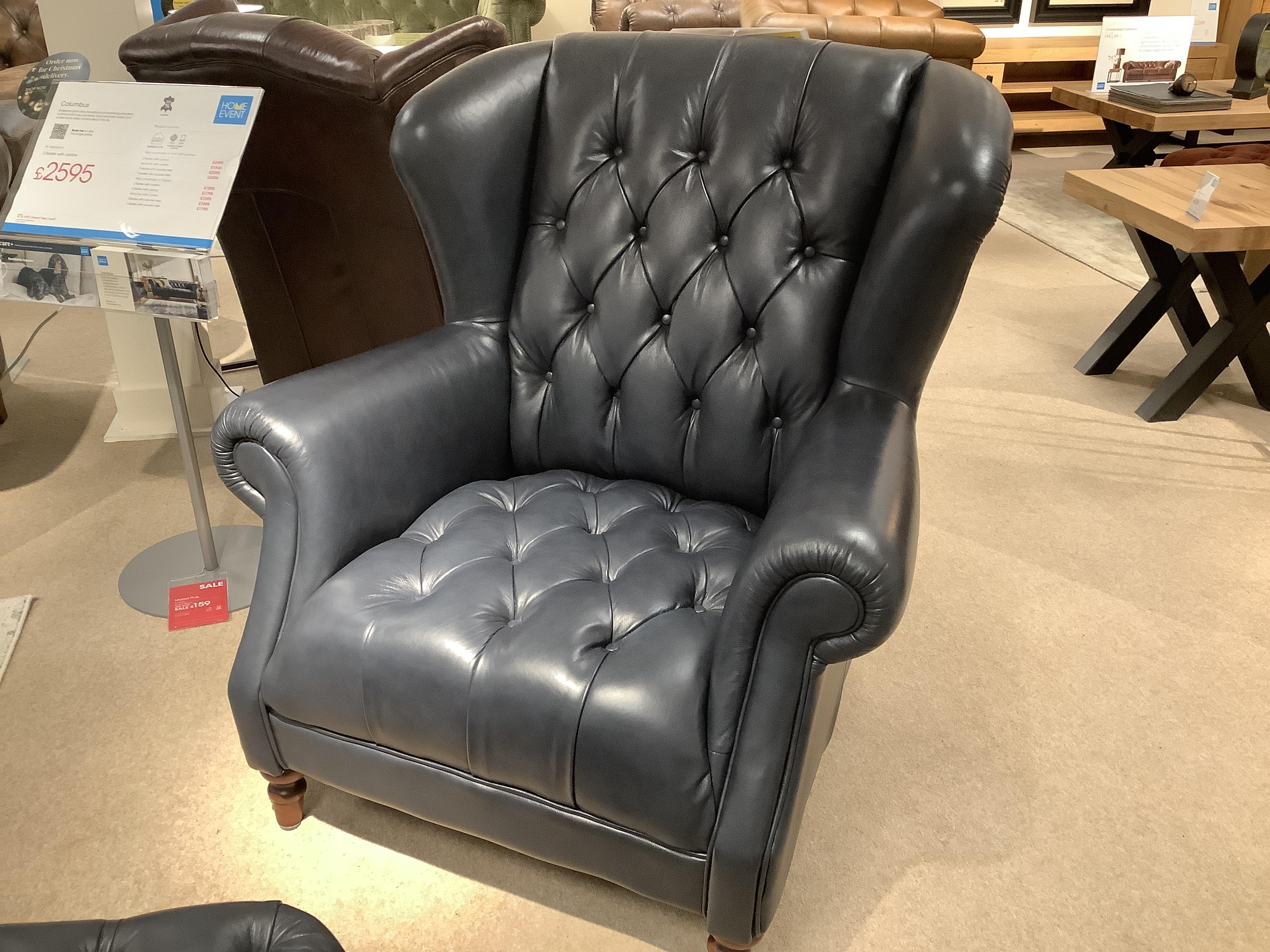Columbus Wing Chair & Half Moon Stool in  on Furniture Village